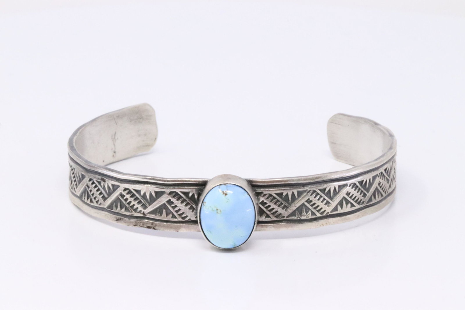 Native American Navajo Handmade Sterling Silver Golden: This is a Native American Navajo Handmade Sterling Silver Golden Hills Turquoise Bracelet By Rick Enriquez.