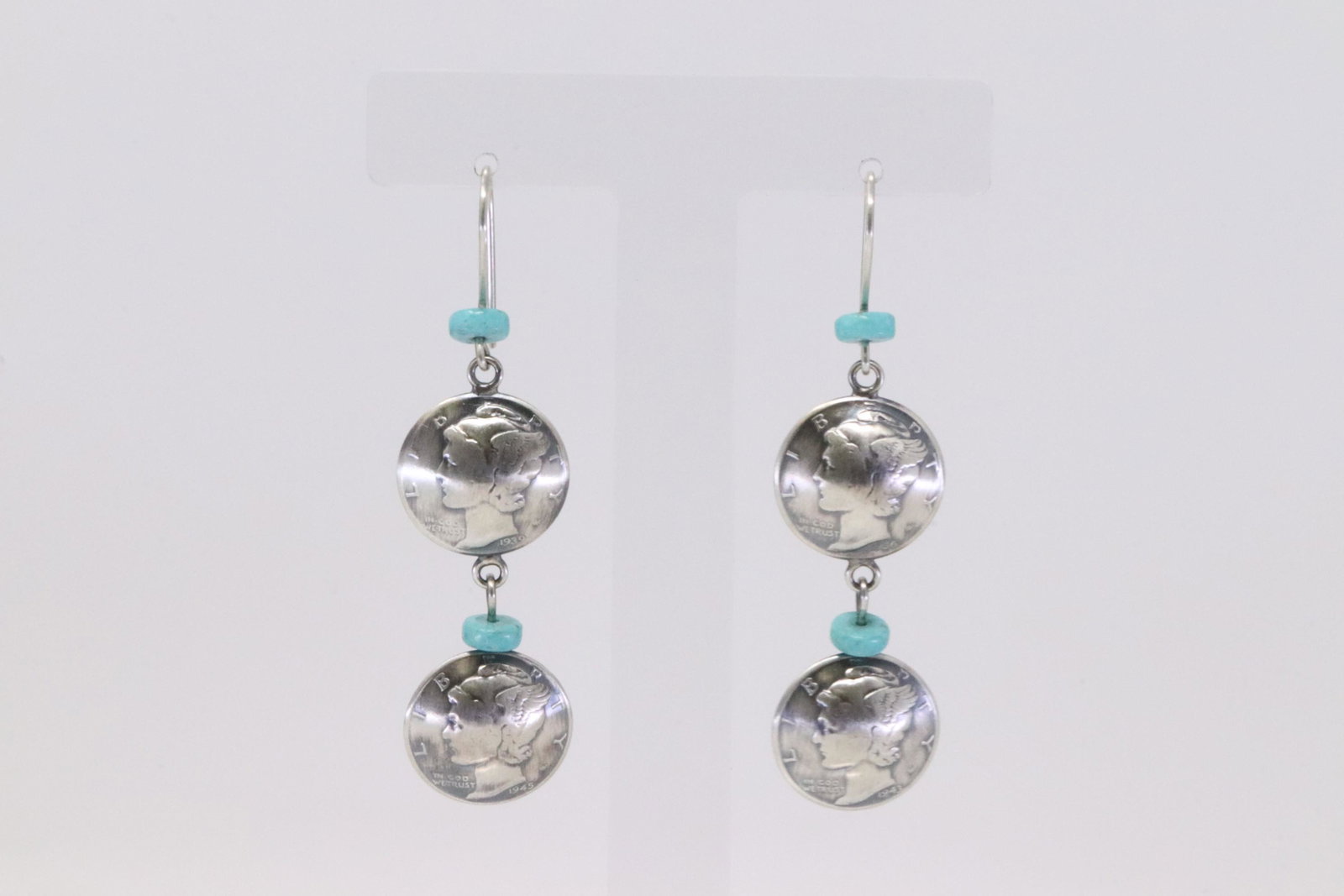 Native America Navajo Handmade Sterling Silver: This is a Native America Navajo Handmade Sterling Silver Turquoise Dime Dangling Earring's By James Mccabe.