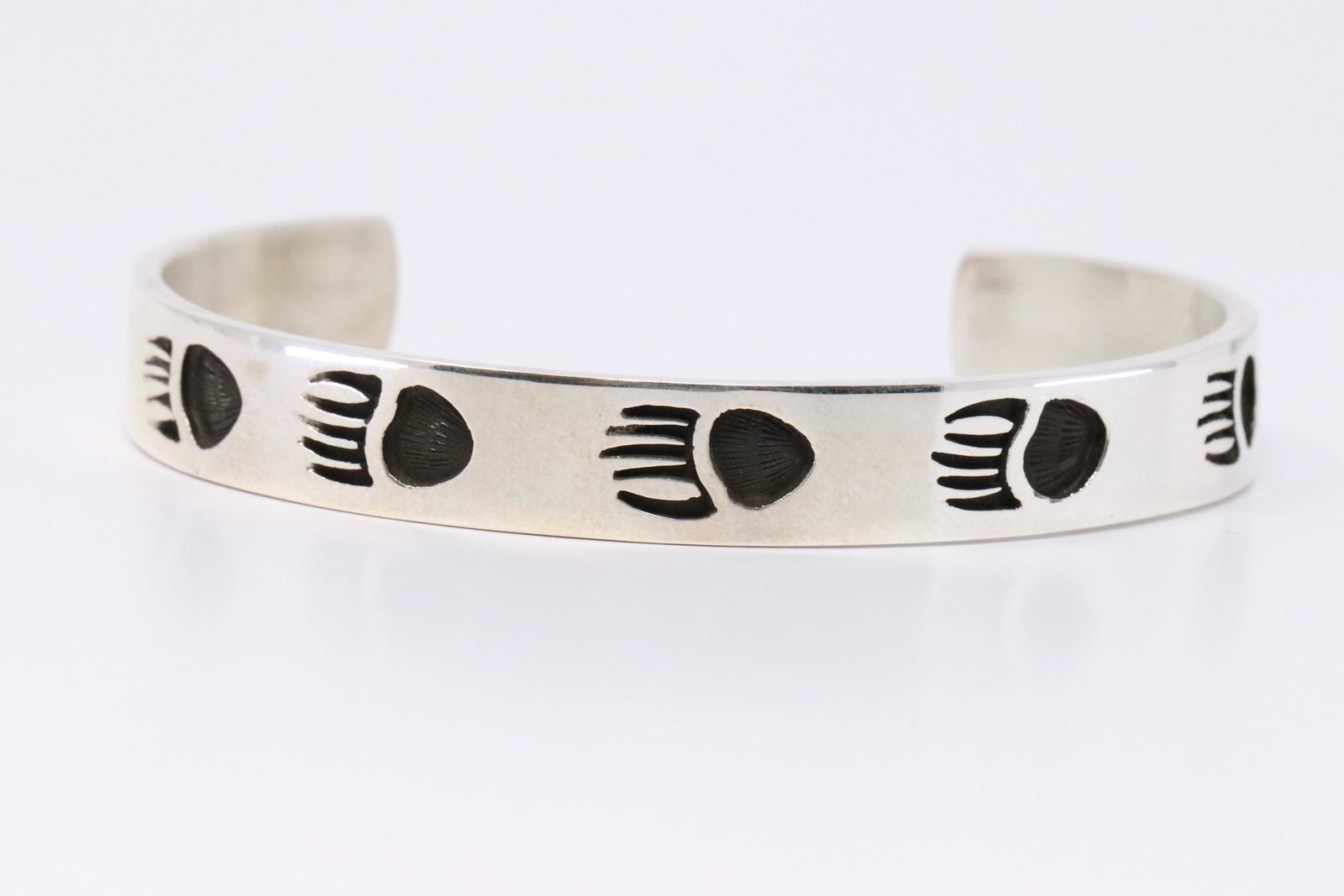 Native American Navajo Handmade Sterling Silver Solid: This is a Native American Navajo Handmade Sterling Silver Solid Bear Paw Bracelet By Calvin Peterson.