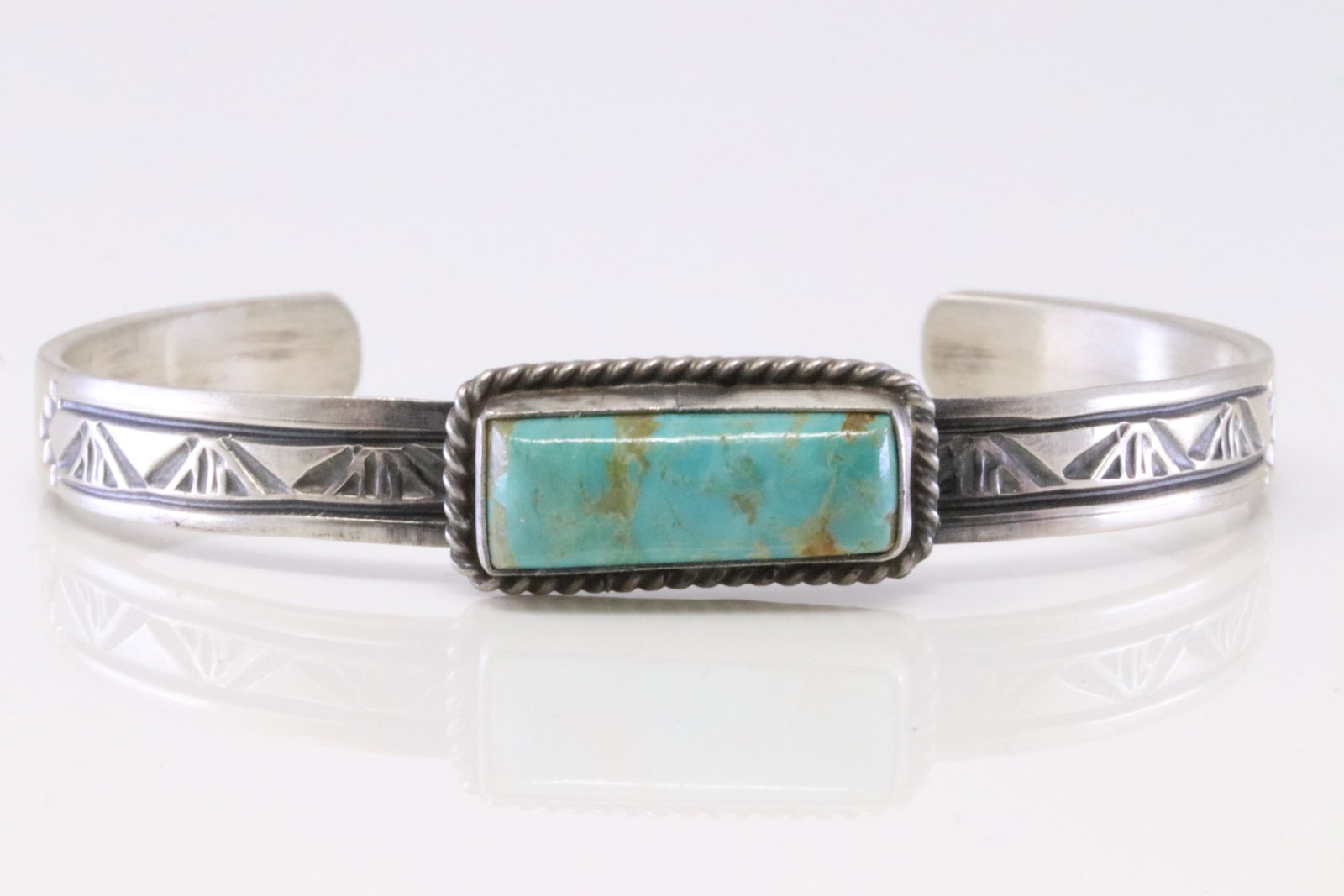 Native America Handmade Navajo Sterling Silver: This is a Native America Handmade Navajo Sterling Silver Turquoise Bracelet By Rick Enriquez.