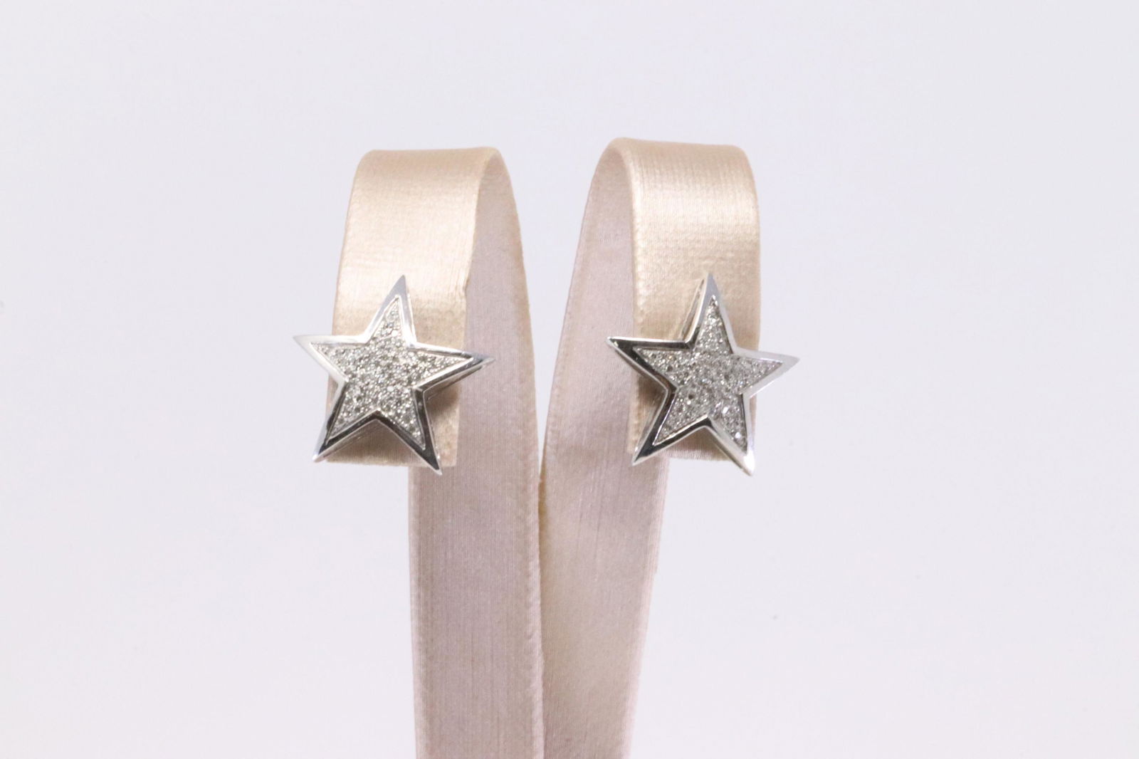 14Kt White Gold Star Diamond Earring. (1 of 5)