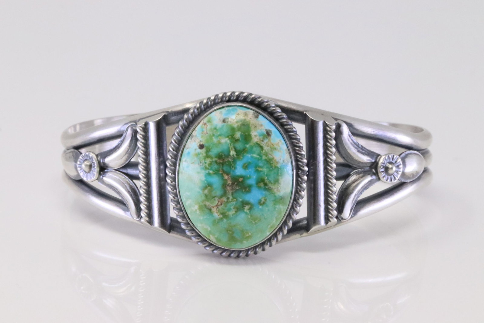 Native American Navajo Handmade Sterling Silver Snora: This is a Native American Navajo Handmade Sterling Silver Snora Gold Turquoise Bracelet By Mary Ann Spencer.