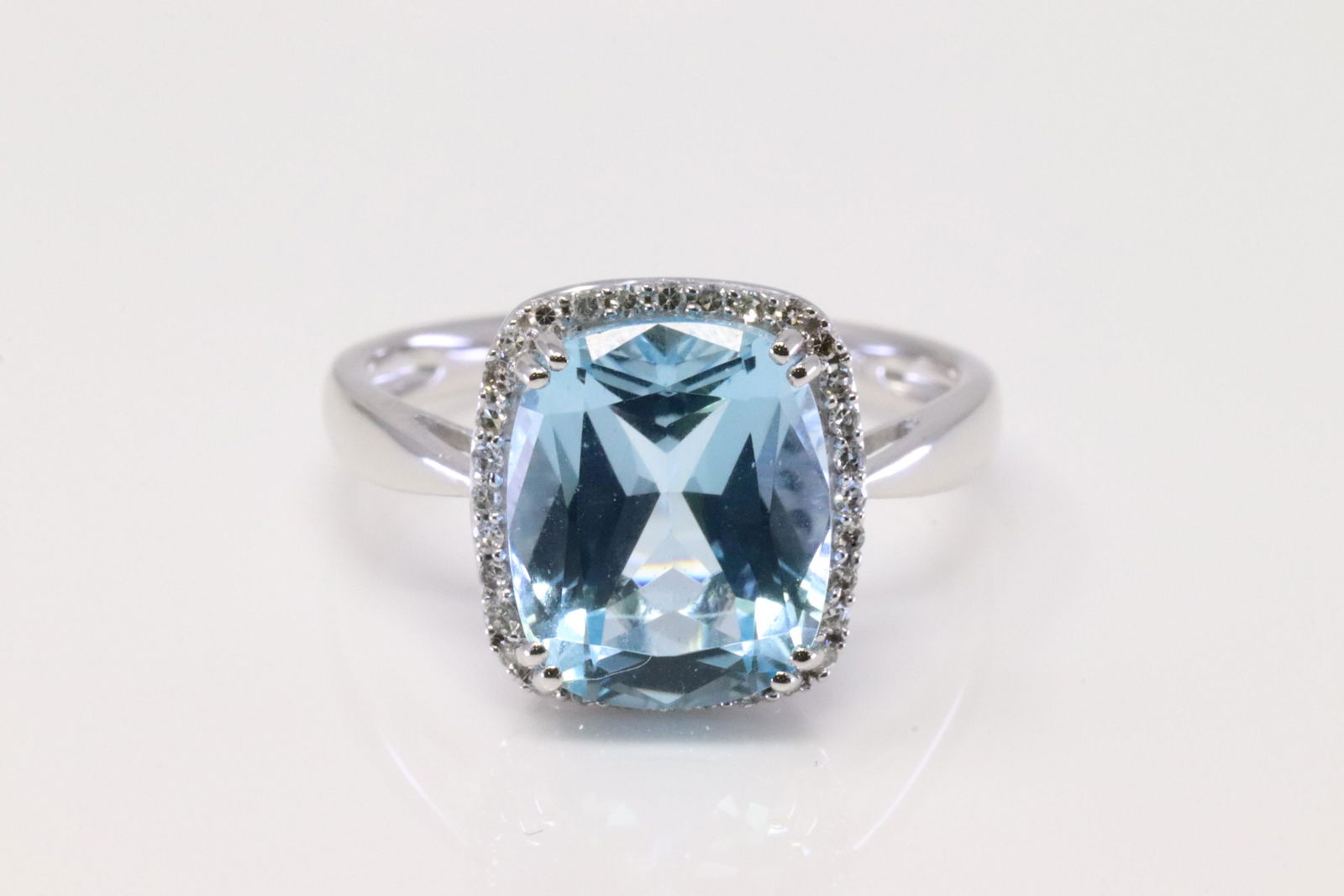 14Kt White Gold Blue Topaz / Diamond Ring. (1 of 4)
