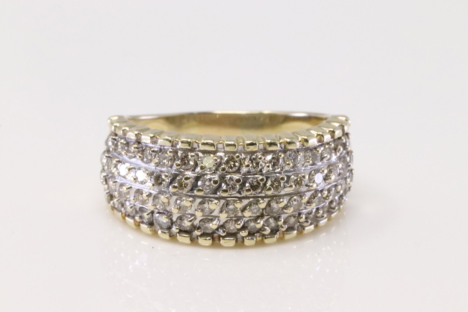 14Kt Yellow Diamond Ring.: Ladies 14Kt Yellow Diamond Ring. Ring has 60 Round Diamonds. Ring size: 8.25. Total weight: 5.00.