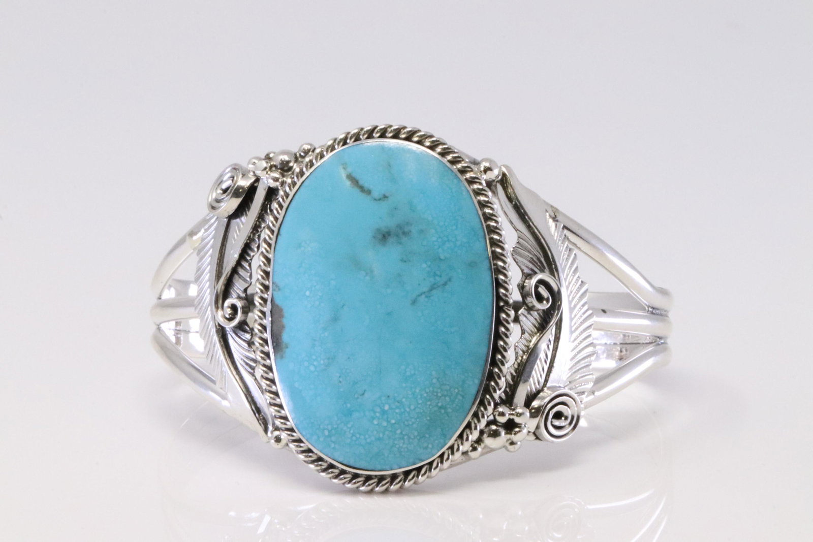 Nativa America Navajo Handmade Sterling Silver: This is a Nativa America Navajo Handmade Sterling Silver Turquoise Bracelet By Ellen Smith.