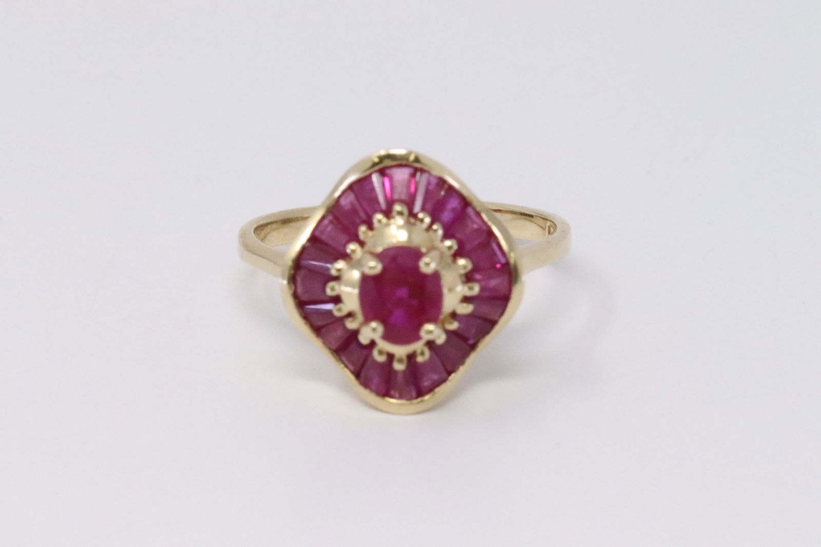 14Kt Ladies Yellow Gold Ruby's Ring. (1 of 4)