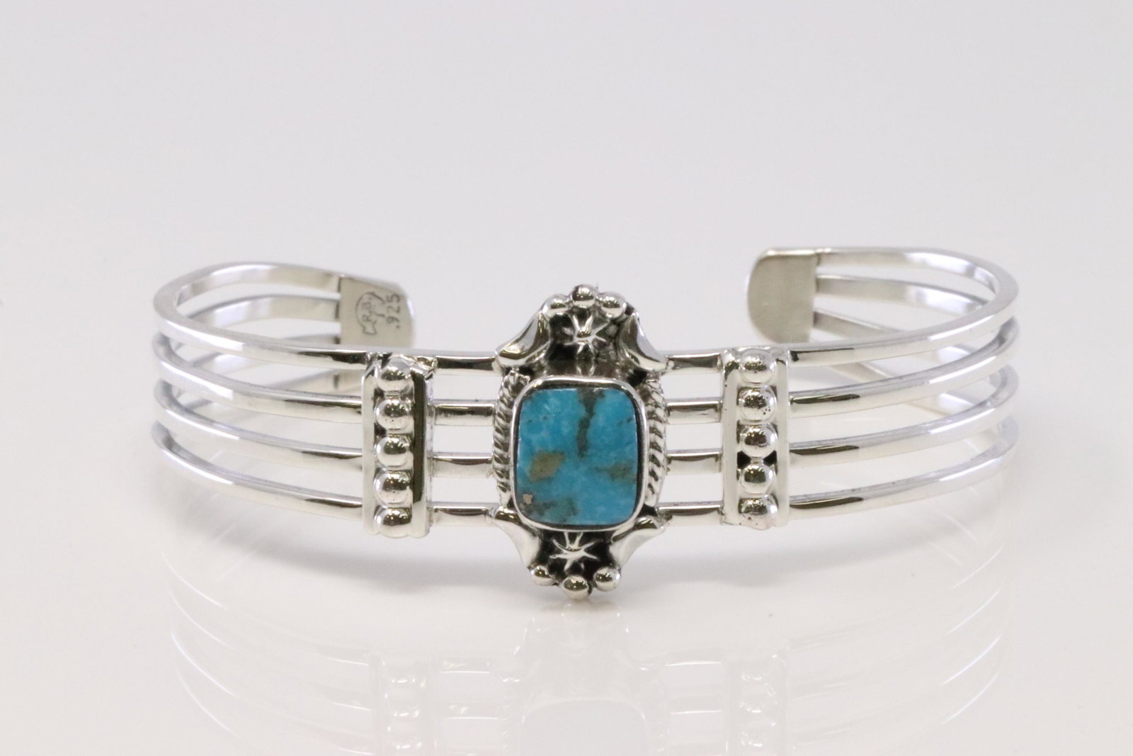 Native America Handmade Navajo Sterling Silver Turquoise Bracelet By Grace Kennneth.: This is a Native America Handmade Navajo Sterling Silver Turquoise Bracelet By Grace Kennneth.