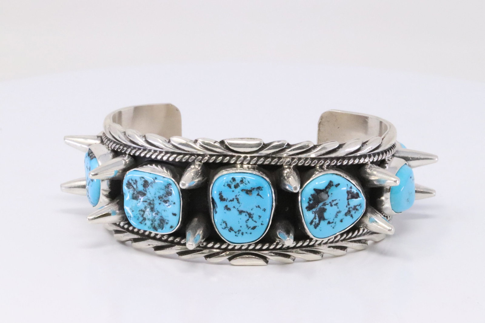 Native American Navajo Handmade Sterling Silver Turquoise Bracelet By Russell Sam.: This is a Native American Navajo Handmade Sterling Silver Turquoise Bracelet By Russell Sam.