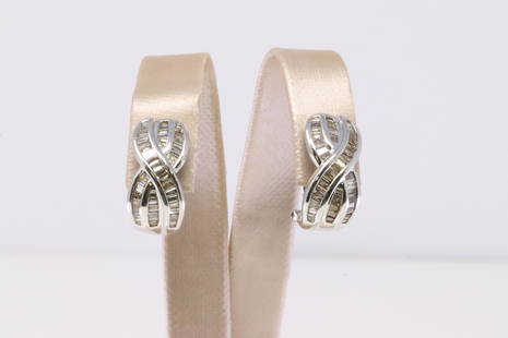 18Kt White Gold Diamond Earring.: Ladies 18Kt White Gold Diamond Infinity Huggie Earring. Earring's has approx 45 Diamonds to each. Diamonds weight: Total weight: 8.73 Grams.
