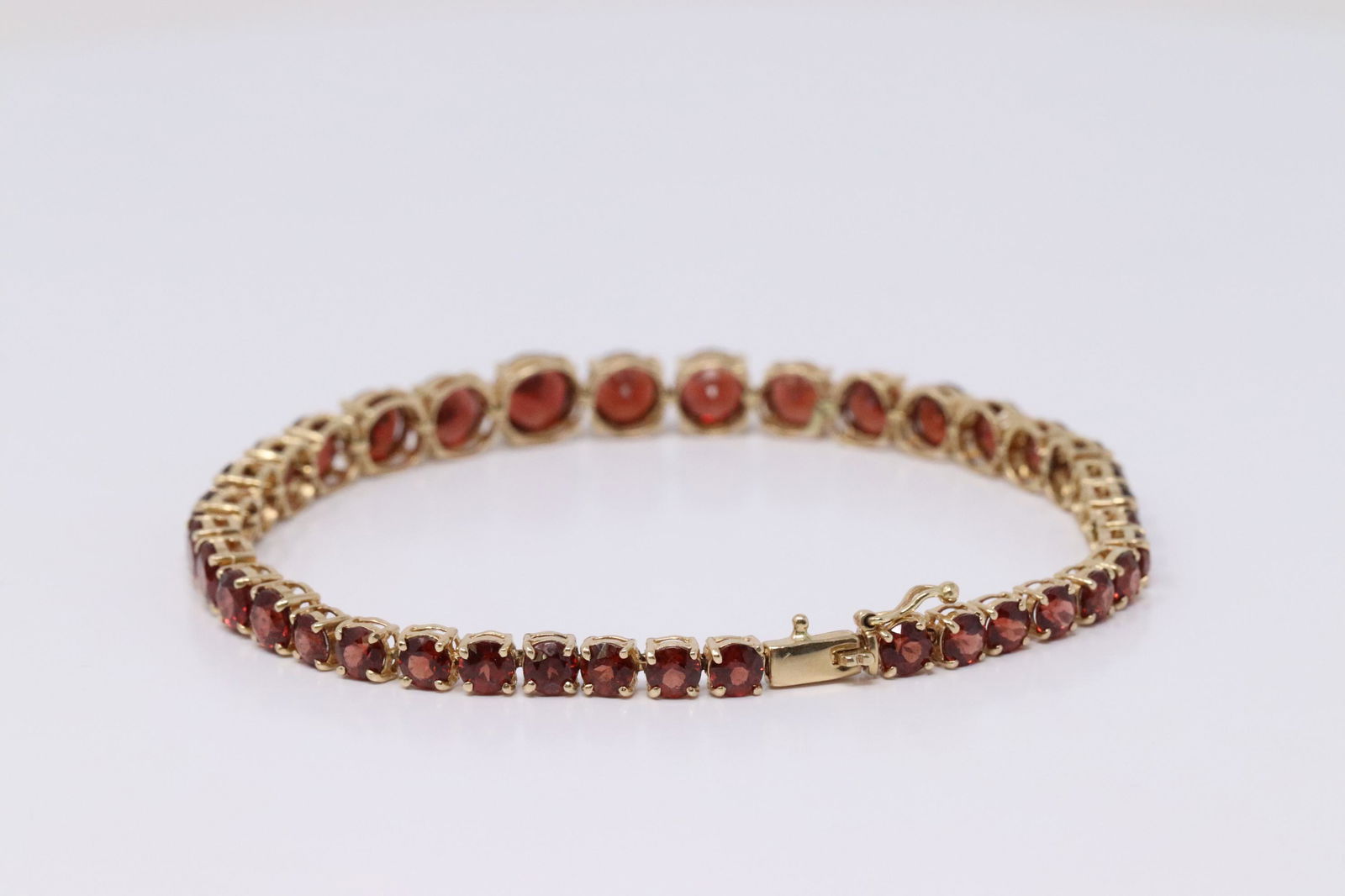 14Kt Yellow Gold Garnet Bracelet. (1 of 5)