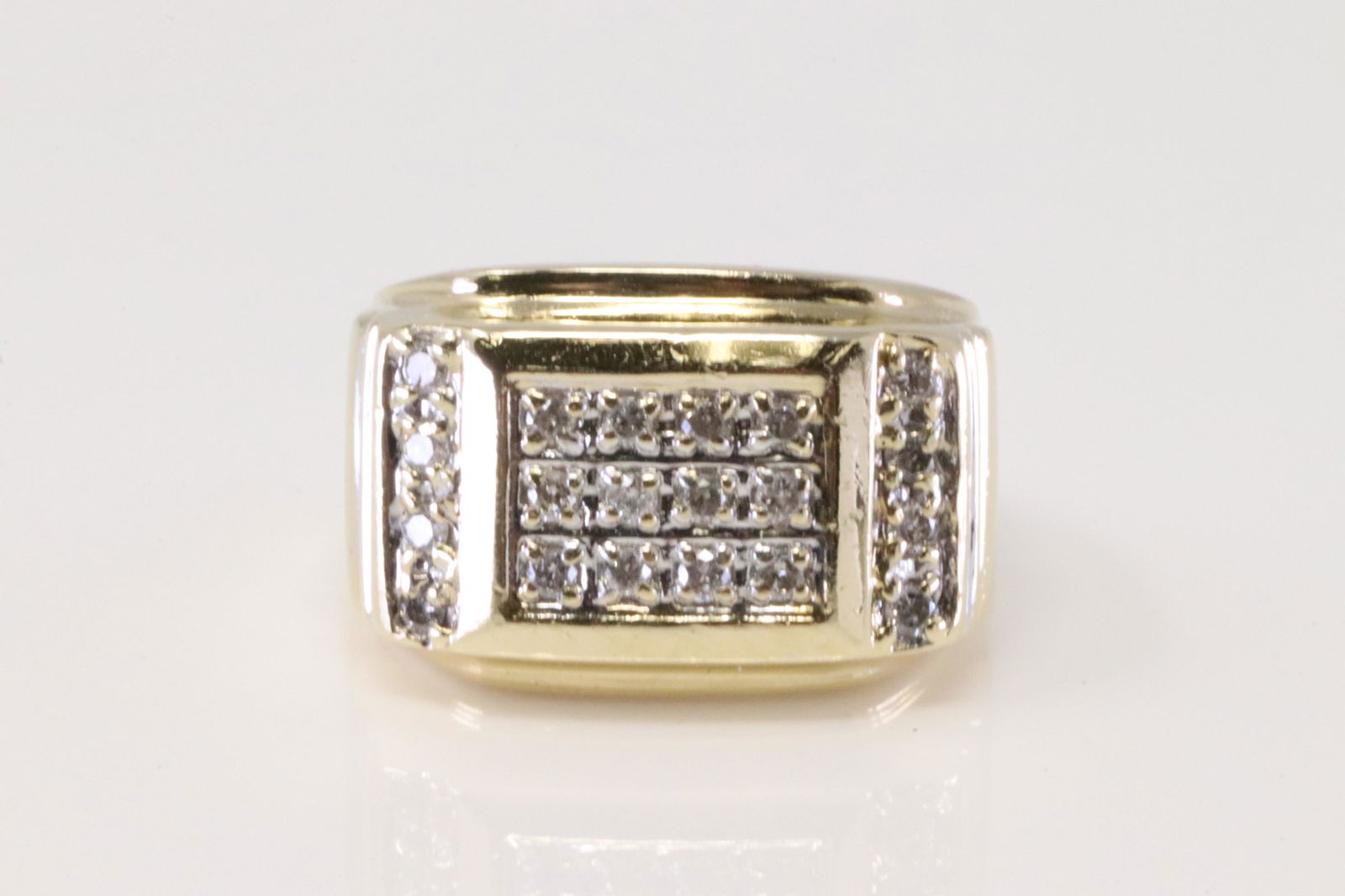 14KT Yellow Gold Rolex Diamond Ring: A 14kt Yellow Gold Diamond Rolex design ring. Ring has a total of 18 round diamonds. Ring size: 6.00. Total weight: 6.40 grams.