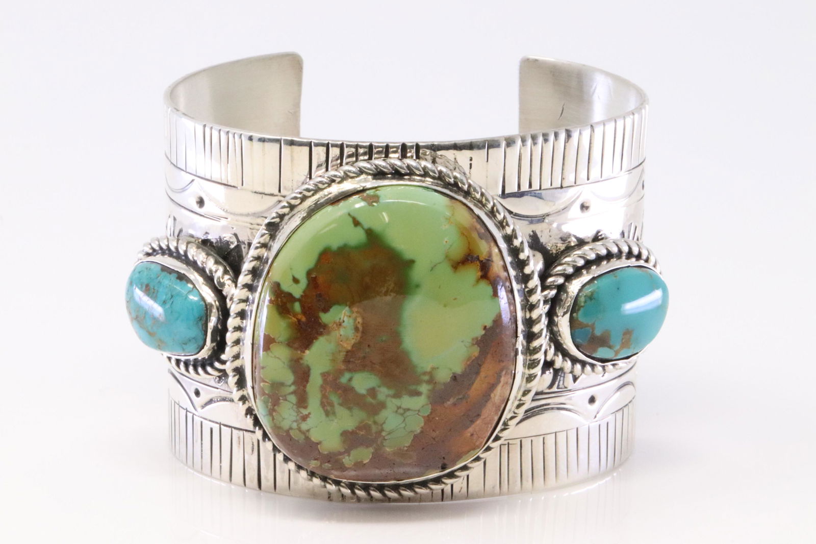 Native American Navajo Handmade Sterling Silver Royston Turquoise on the center Bracelet. (1 of 5)