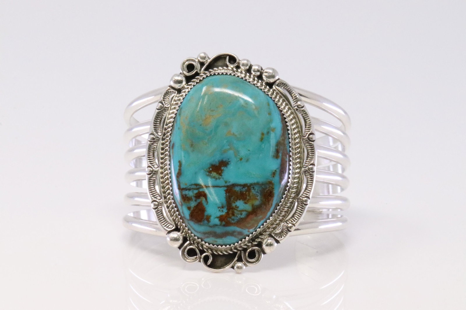 Native America Handmade Navajo Sterling Silver Turquoise Bracelet By Leslie Nez.: This is a Native America Handmade Navajo Sterling Silver Turquoise Bracelet By Leslie Nez.