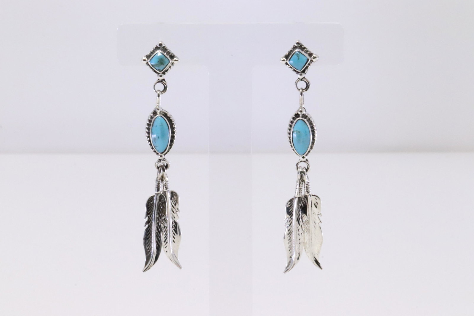 Native America Navajo Handmade Sterling Silver Turquoise Feather Post / Dangling Earring's By Sadie: This is a Native America Navajo Handmade Sterling Silver Turquoise Feather Post / Dangling Earring's By Sadie Jim.