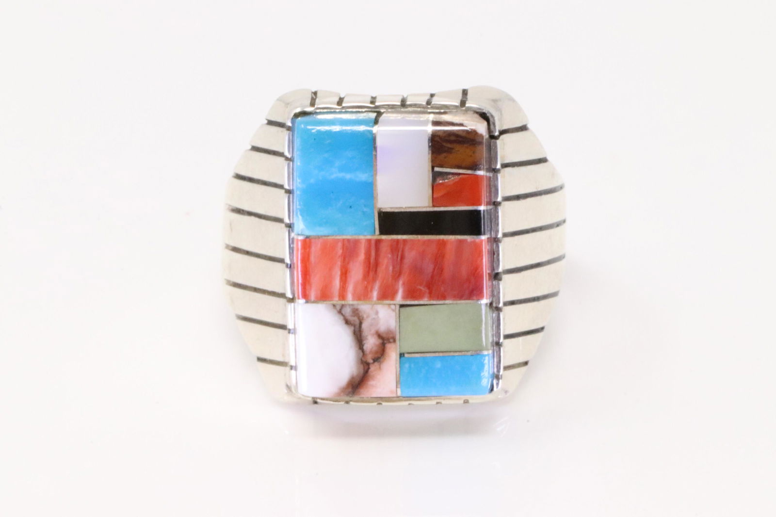 Native American Navajo Handmade Sterling Silver Multi-Color Inlay Ring By Ray Jack.: This is a Native American Navajo Handmade Sterling Silver Multi-Color Inlay Ring By Ray Jack. Ring size: 11.50.