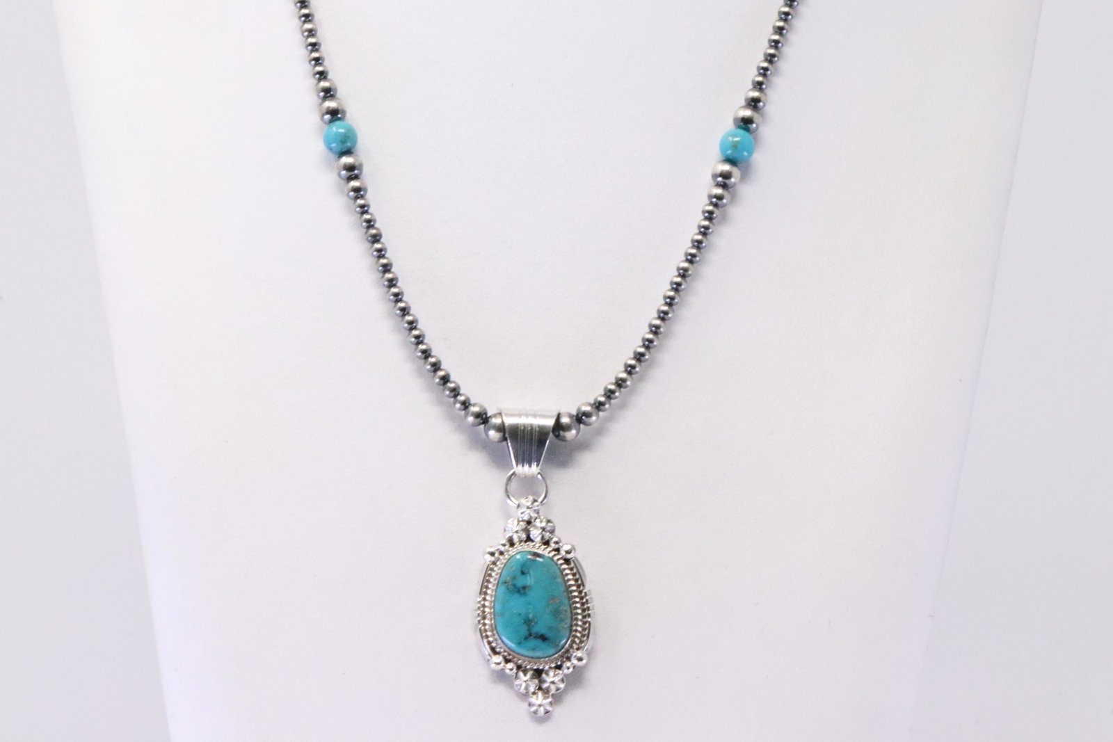 Native American Navajo Handmade Sterling Silver Turquoise Pendant & Pearl Beaded Necklace By Daniel: This is a Native American Navajo Handmade Sterling Silver Turquoise Pendant & Pearl Beaded Necklace By Daniel Benally. Necklace length: 16.00"