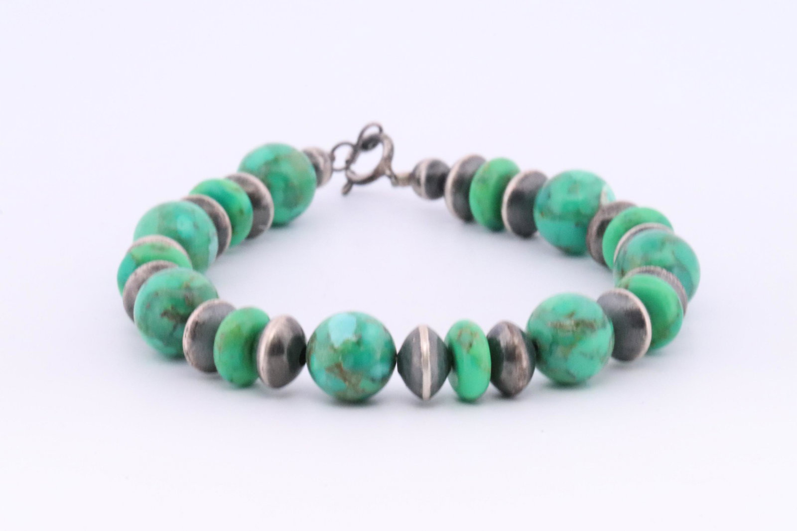 Native America Navajo Handmade Sterling Silver Green Stone / Beaded Bracelet.: This is a Native America Navajo Handmade Sterling Silver Green Stone / Beaded Bracelet. Bracelet length: 7.00"