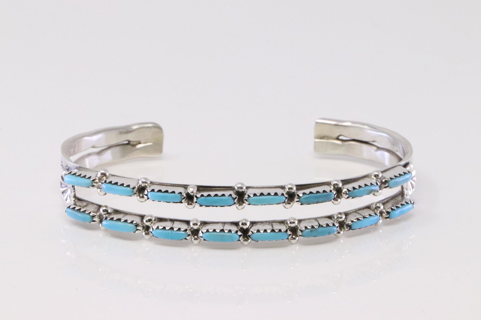 Native America Zuni Handmade Sterling Silver Turquoise Bracelet By Murray Hannaweeka.: This is a Native America Zuni Handmade Sterling Silver Turquoise Bracelet By Murray Hannaweeka.