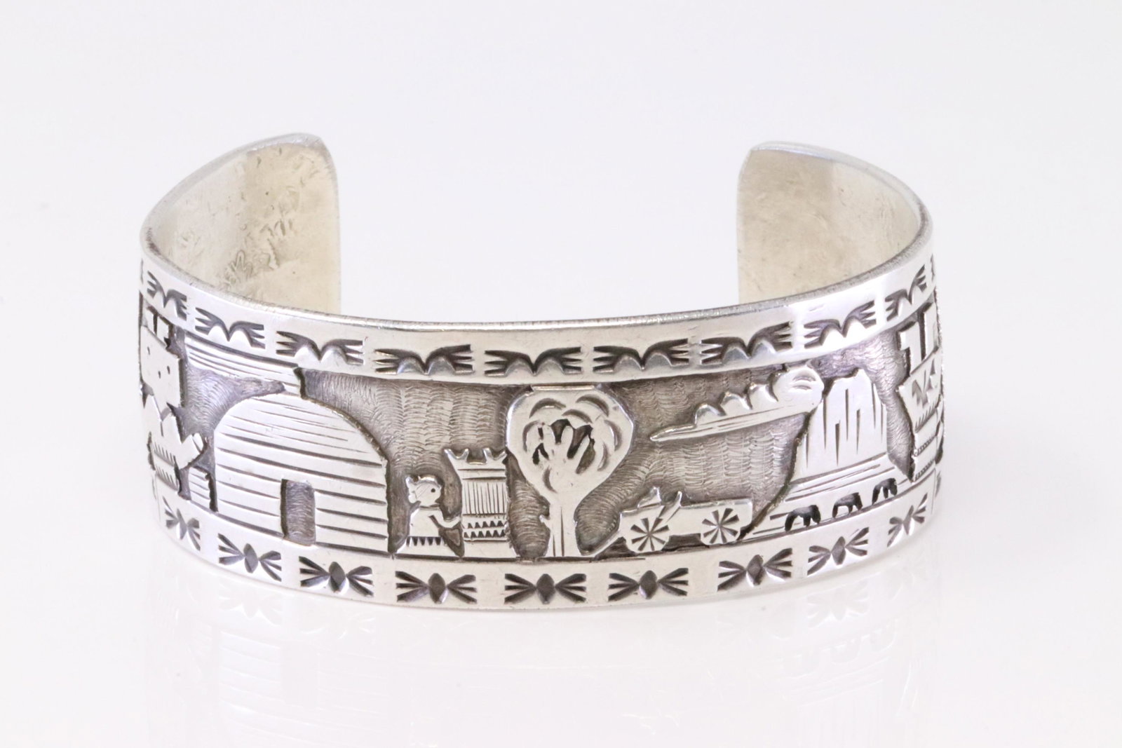 Native America Navajo Handmade Sterling Silver Storyteller Cuff Bracelet By R.W.: This is a Native America Navajo Handmade Sterling Silver Storyteller Cuff Bracelet By R.W.