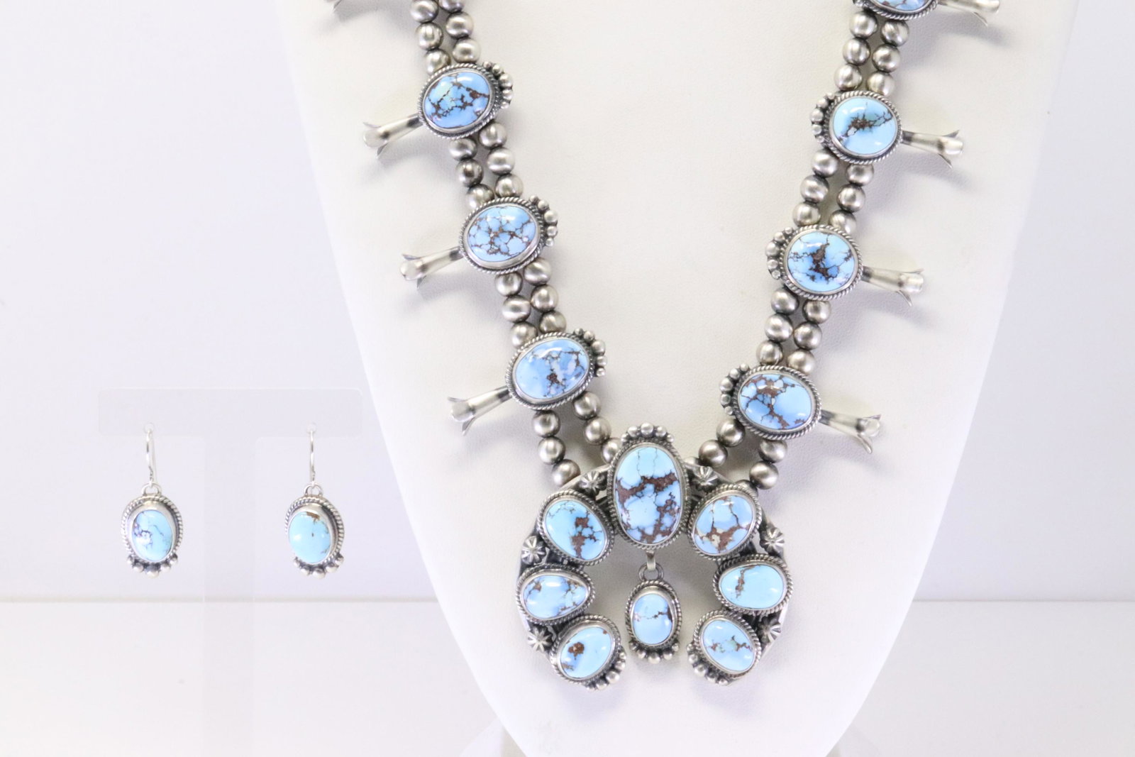 Native America Navajo Handmade Sterling Silver Golden Hills Turquoise Squash Blossom Necklace & Earr: This is a Native America Navajo Handmade Sterling Silver Golden Hills Turquoise Squash Blossom Necklace & Earring's Set By Thomas Francisco. Necklace length: 26.00"