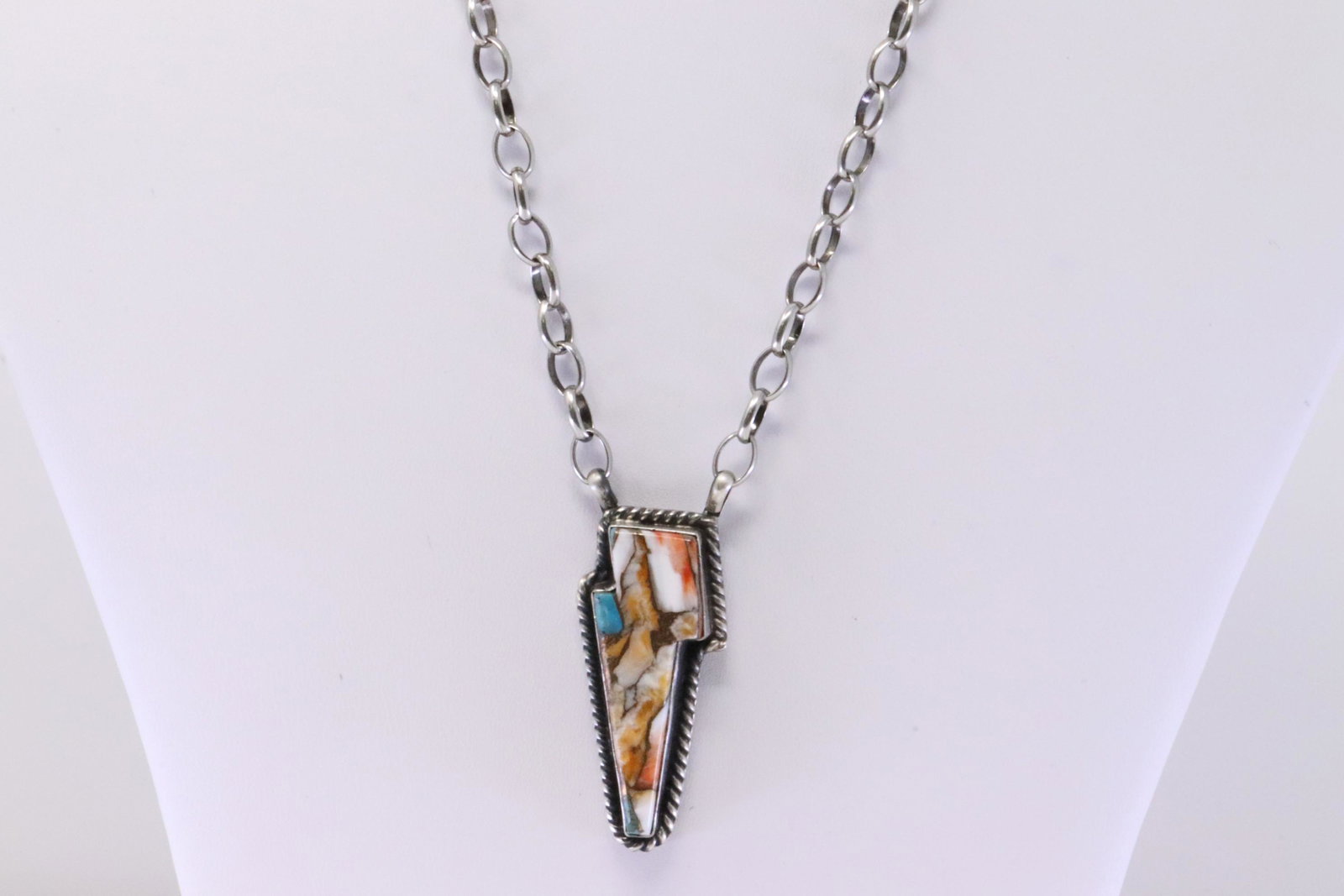 Native America Handmade Navajo Sterling Silver Comptressed Turquoise Necklace By Alfred Martinez.: This is a Native America Handmade Navajo Sterling Silver Comptressed Turquoise Necklace By Alfred Martinez. Necklace length: 16.00"
