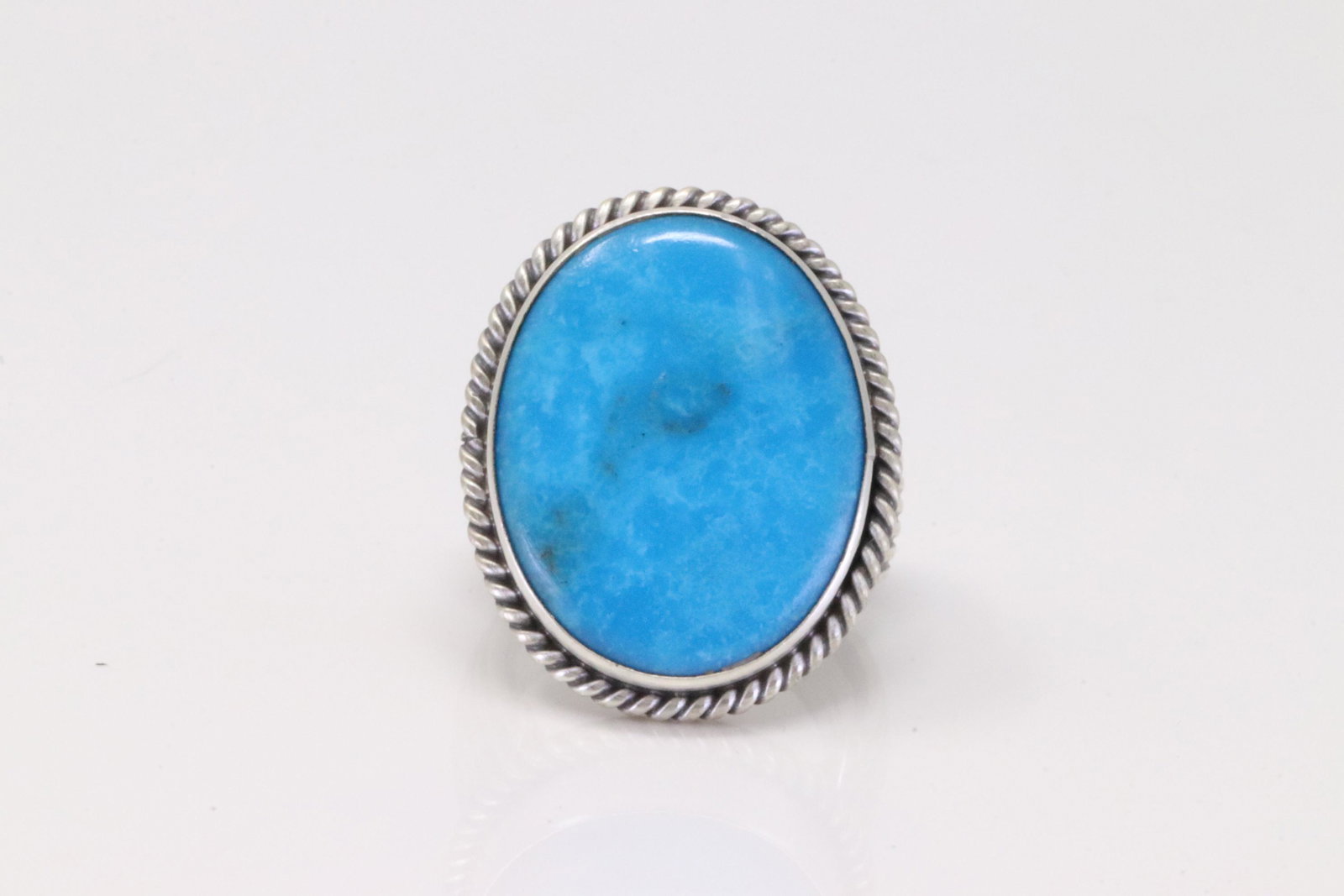 Native America Navajo Handmade Sterling Silver Turquoise Ring By Samuel Yellowhair.: This is a Native America Navajo Handmade Sterling Silver Turquoise Ring By Samuel Yellowhair. Ring size: 6.25.