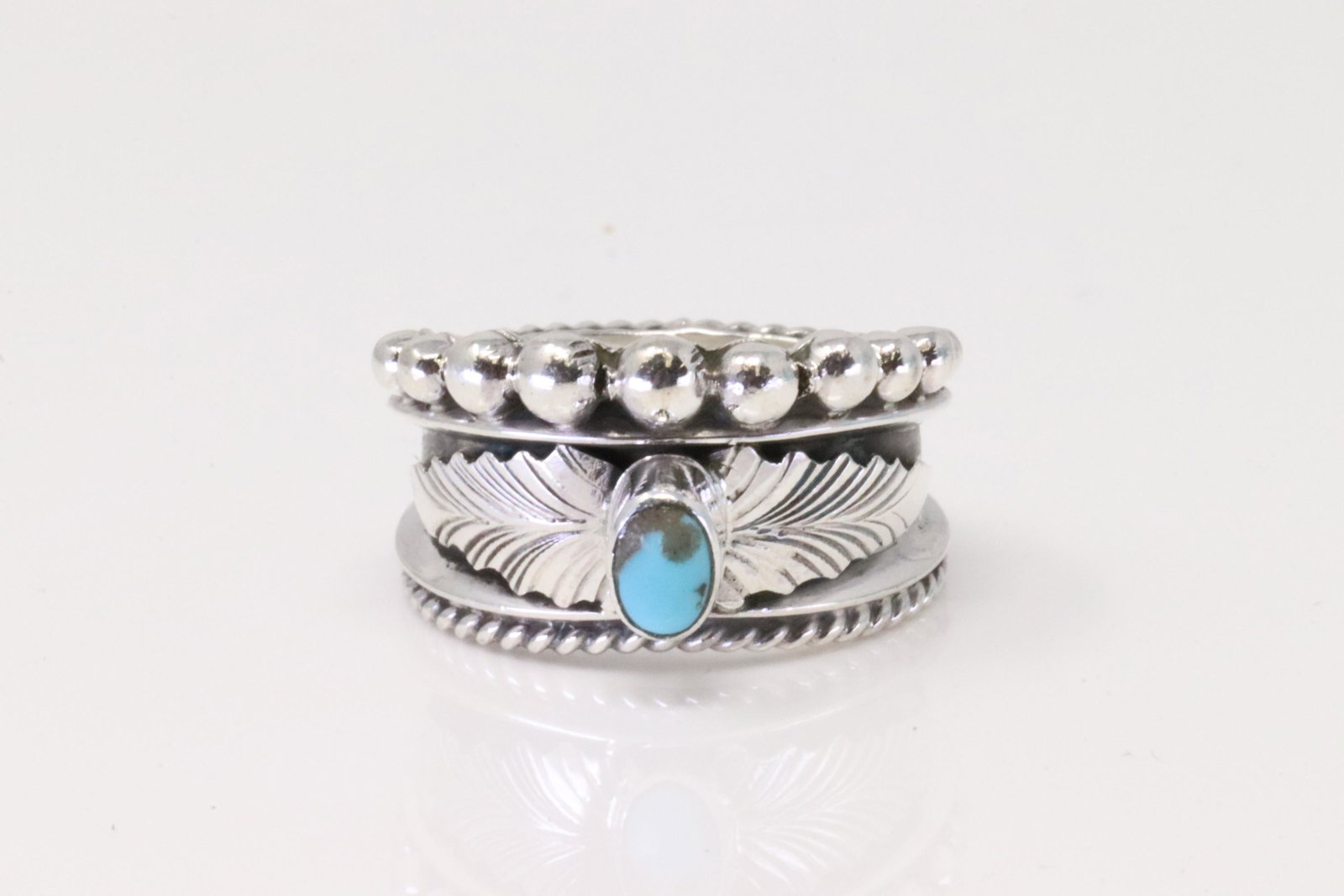 Native America Navajo Handmade Sterling Silver Turquoise Ring By Tom Lewis.: This is a Native America Navajo Handmade Sterling Silver Turquoise Ring By Tom Lewis. Ring size: 9.25.