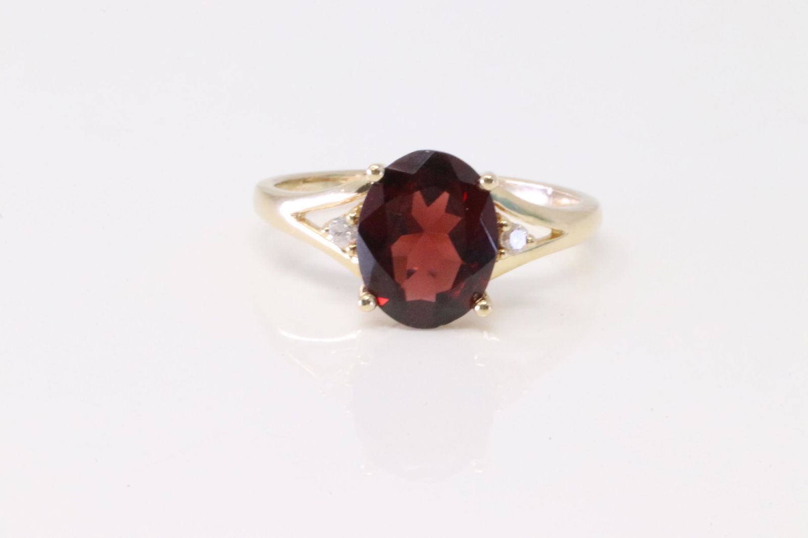 14Kt Garnet and Diamond ring. (1 of 3)