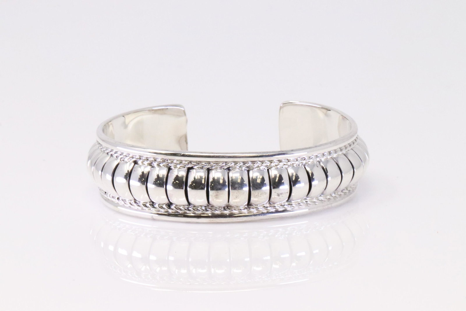 Native America Navajo Handmade Sterling Silver Cuff Bracelet By Manuel Johnson.: This is a ative America Navajo Handmade Sterling Silver Cuff Bracelet By Manuel Johnson.