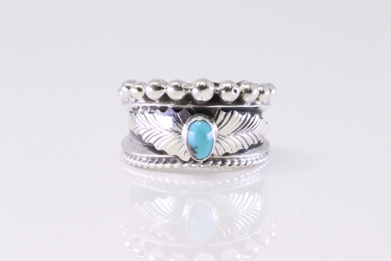 Native America Navajo Handmade Sterling Silver Turquoise Ring By Tom Lewis.: This is a Native America Navajo Handmade Sterling Silver Turquoise Ring By Tom Lewis. Ring size: 9.50.