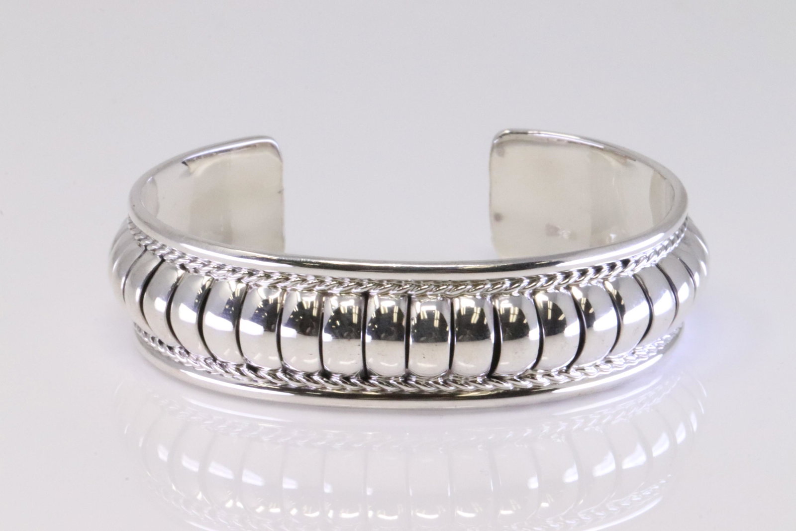Native America Navajo Sterling Silver Cuff Bracelet By Manuel Johnson.: This is a Native America Navajo Sterling Silver Cuff Bracelet By Manuel Johnson.