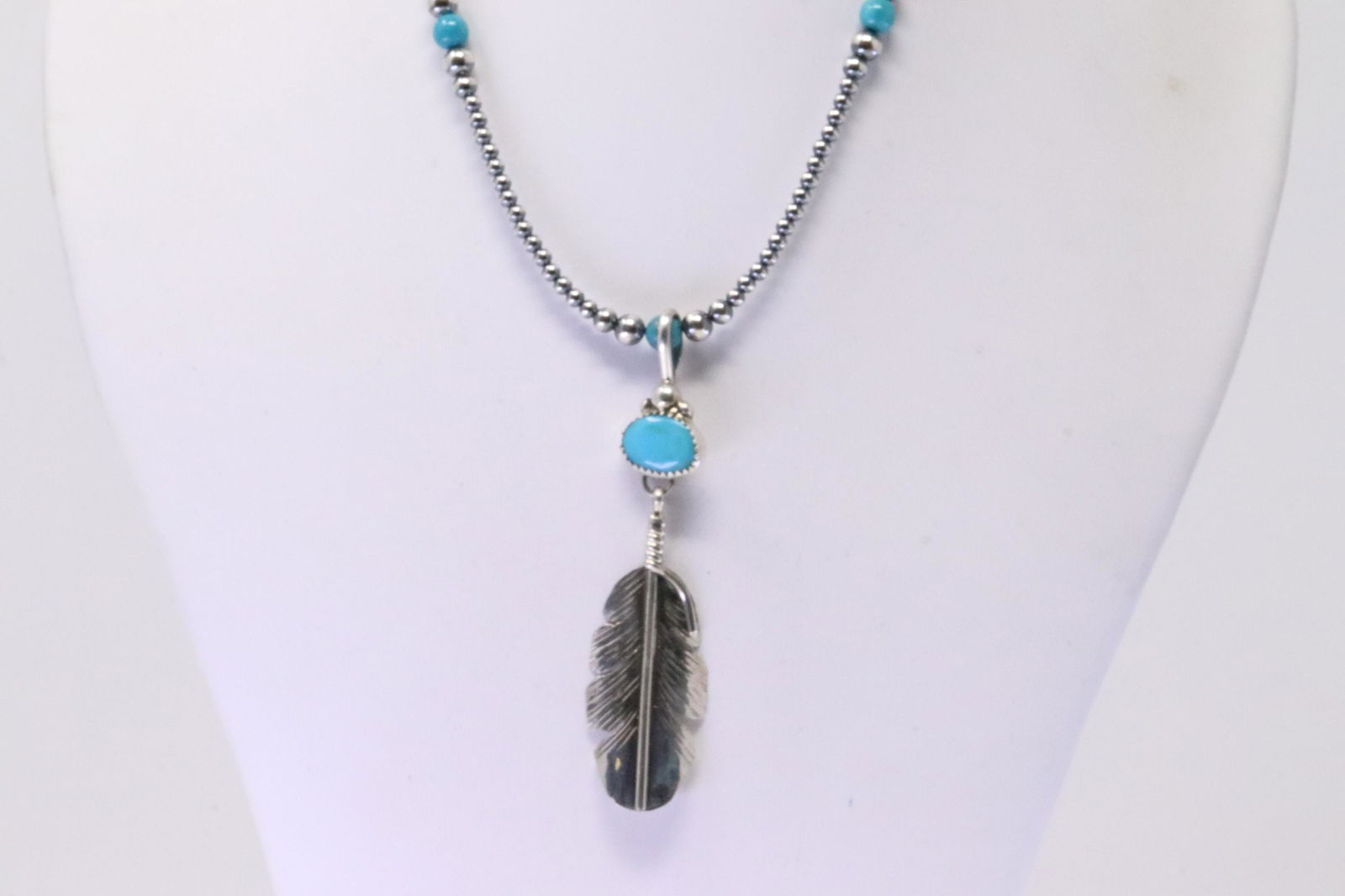 Native America Navajo Sterling Silver Turquoise Feather Pendant. With Pear Beaded Sterling Silver: This is a Native America Navajo Sterling Silver Turquoise Feather Pendant. With Pear Beaded Sterling Silver Machine Made Necklace By Aaron Davis. Necklace length: 14.00"