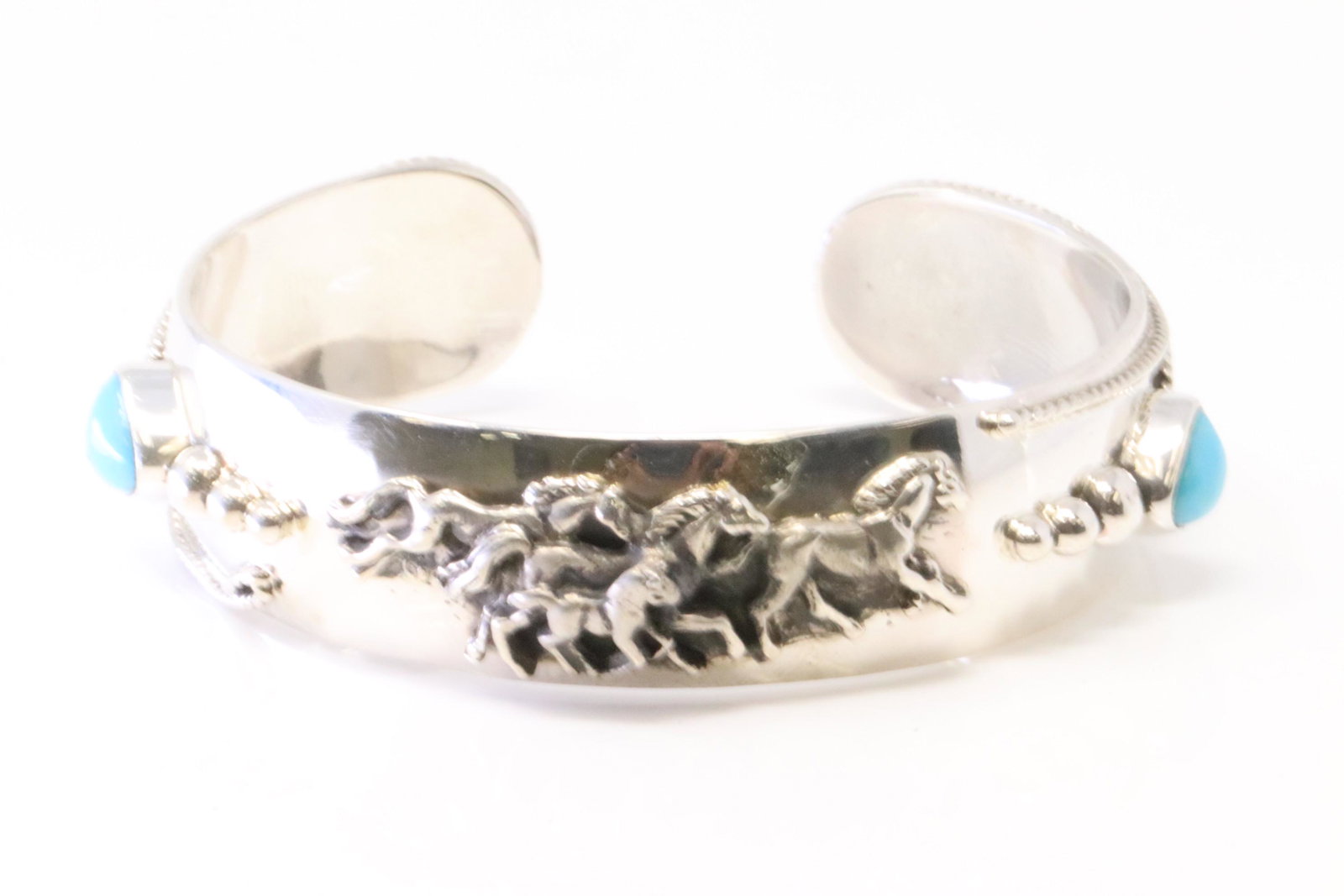 Native America Navajo Sterling Silver Turquoise Horse Bracelet Cuff By Bobby Platero.: This is a Native America Navajo Sterling Silver Turquoise Horse Bracelet Cuff By Bobby Platero.