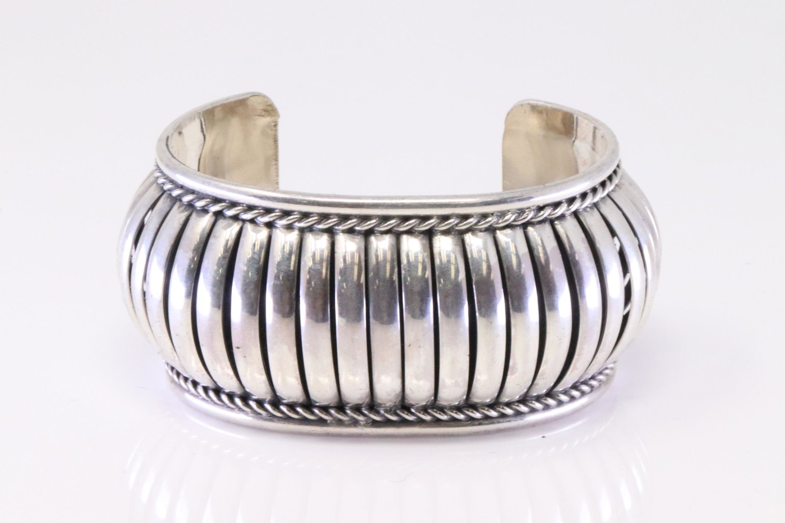 Native America Navajo Sterling Silver Cuff Bracelet By Samuel Johnson.: This is a Native America Navajo Sterling Silver Cuff Bracelet By Samuel Johnson.