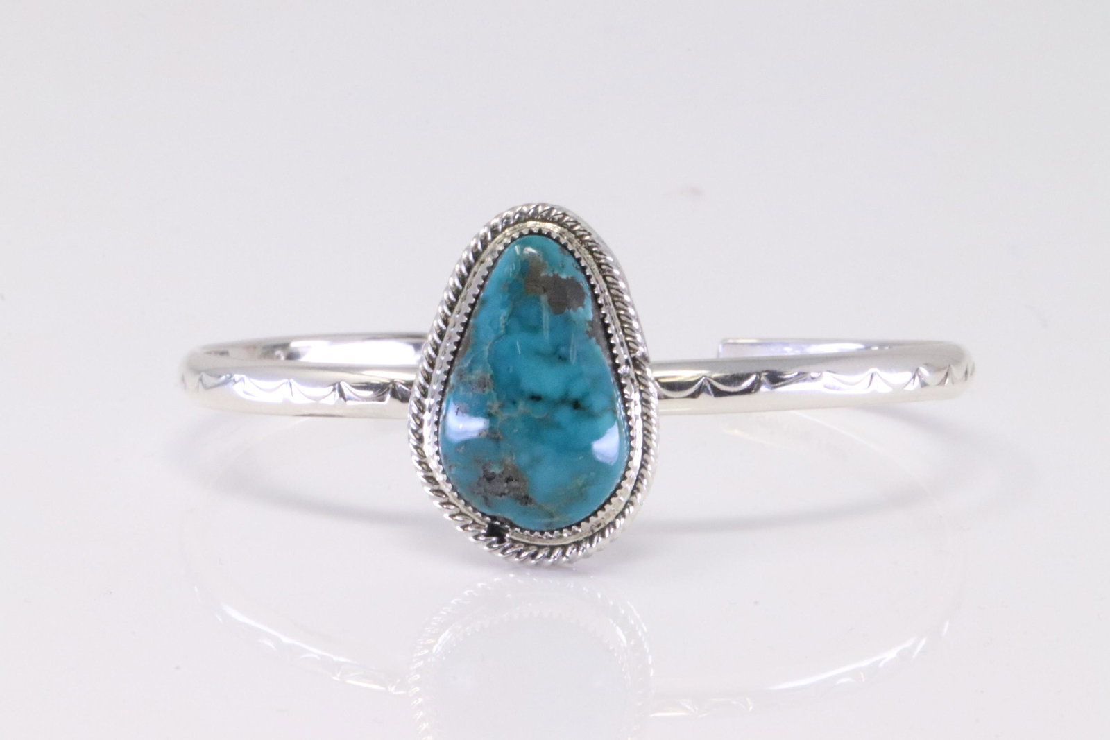 Native America Navajo Sterling Silver Turquoise Bracelet Cuff By Suzanna Johnson.: This is a Native America Navajo Sterling Silver Turquoise Bracelet Cuff By Suzanna Johnson.