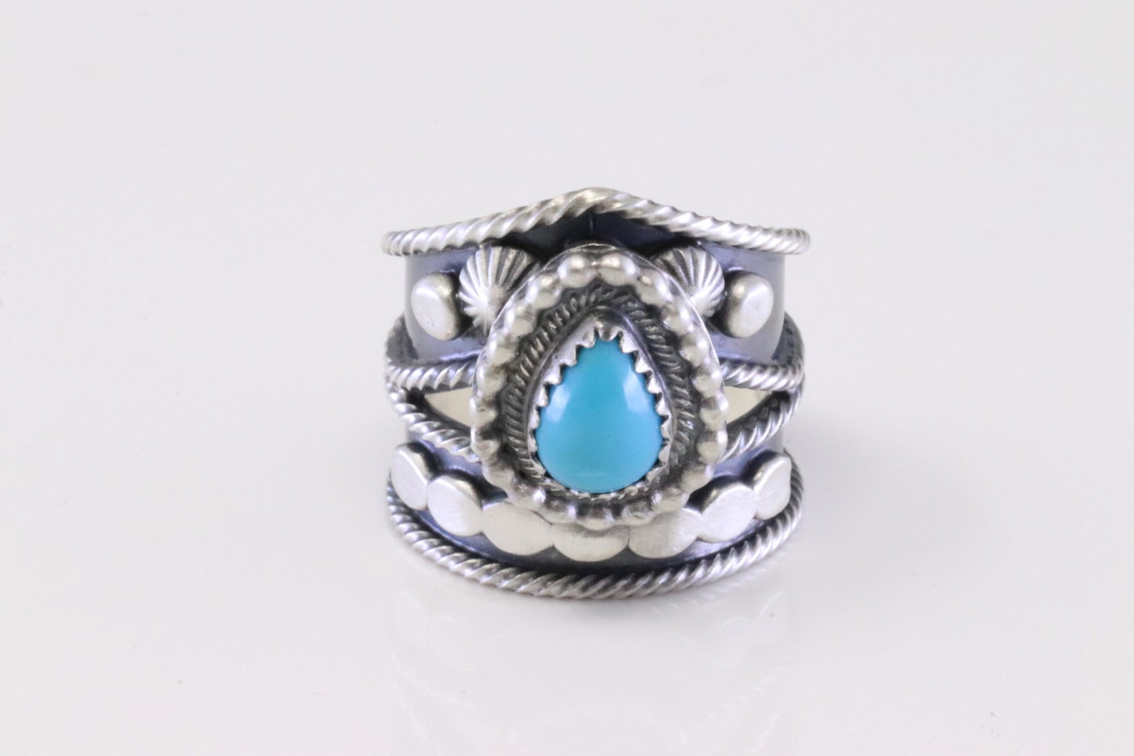 Native America Navajo Sterling Silver Turquoise Ring By Tom Lewis.: This is a Native America Navajo Sterling Silver Turquoise Ring By Tom Lewis. Ring size: 6.25.