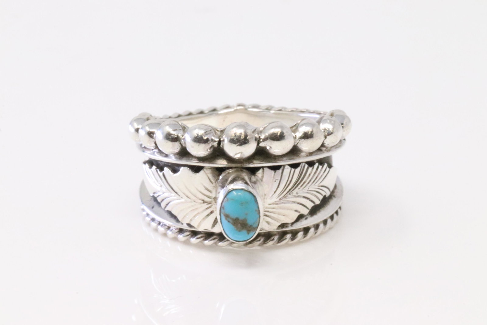 Native America Navajo Sterling Silver Turquoise Ring By Tom Lewis.: This is a Native America Navajo Sterling Silver Turquoise Ring By Tom Lewis. Ring size: 7.50.