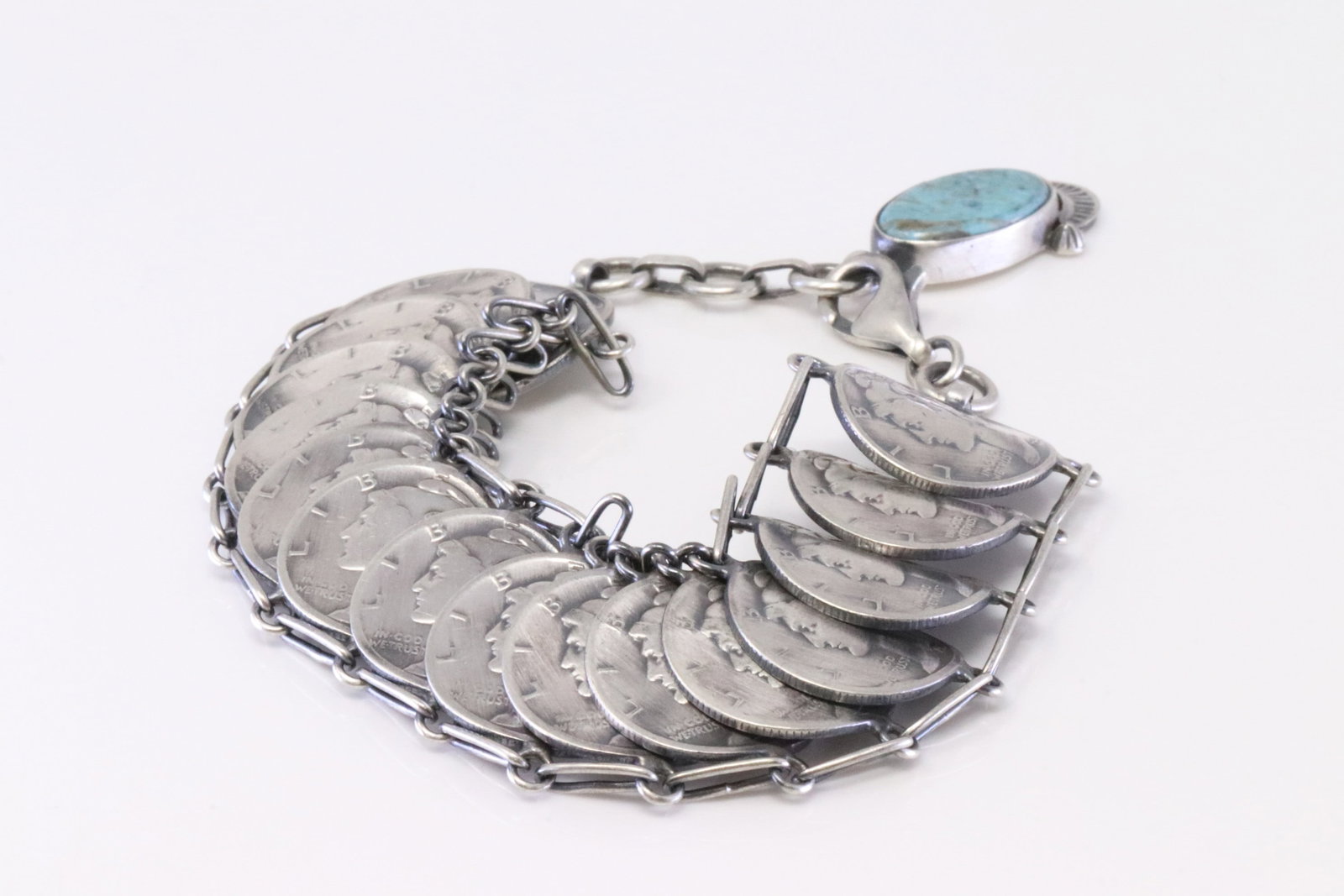 Native America Navajo Sterling Silver Turquoise Liberty Dime Bracelet Link By James McCabe.: This is a Native America Navajo Sterling Silver Turquoise Liberty Dime Bracelet Link By James McCabe. Bracelet length: 7.00" 7.50" Adjustable.