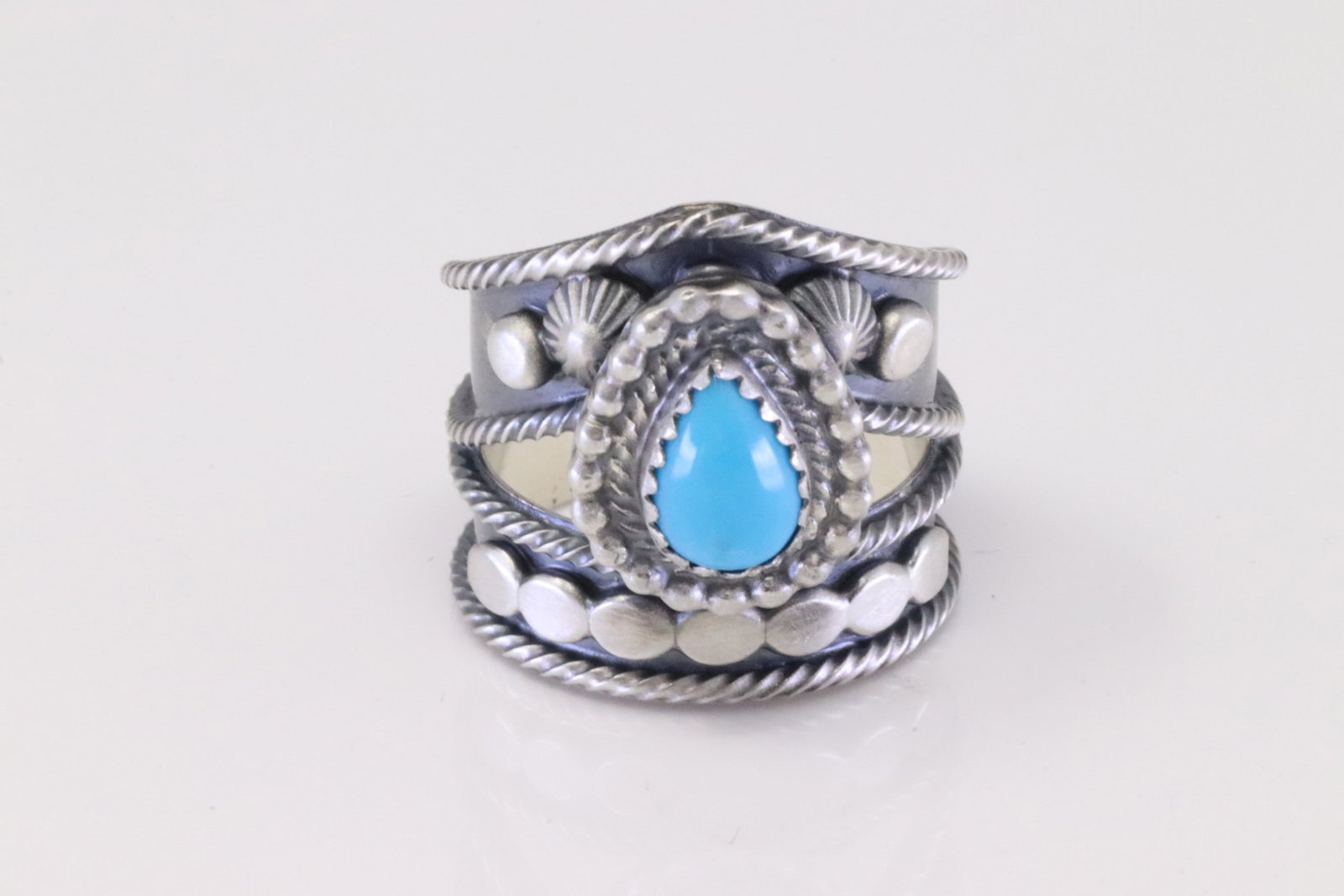 Native America Navajo Sterling Silver Turquoise Ring By Tom Lewis.: This is a Native America Navajo Sterling Silver Turquoise Ring By Tom Lewis. Ring size: 7.25.