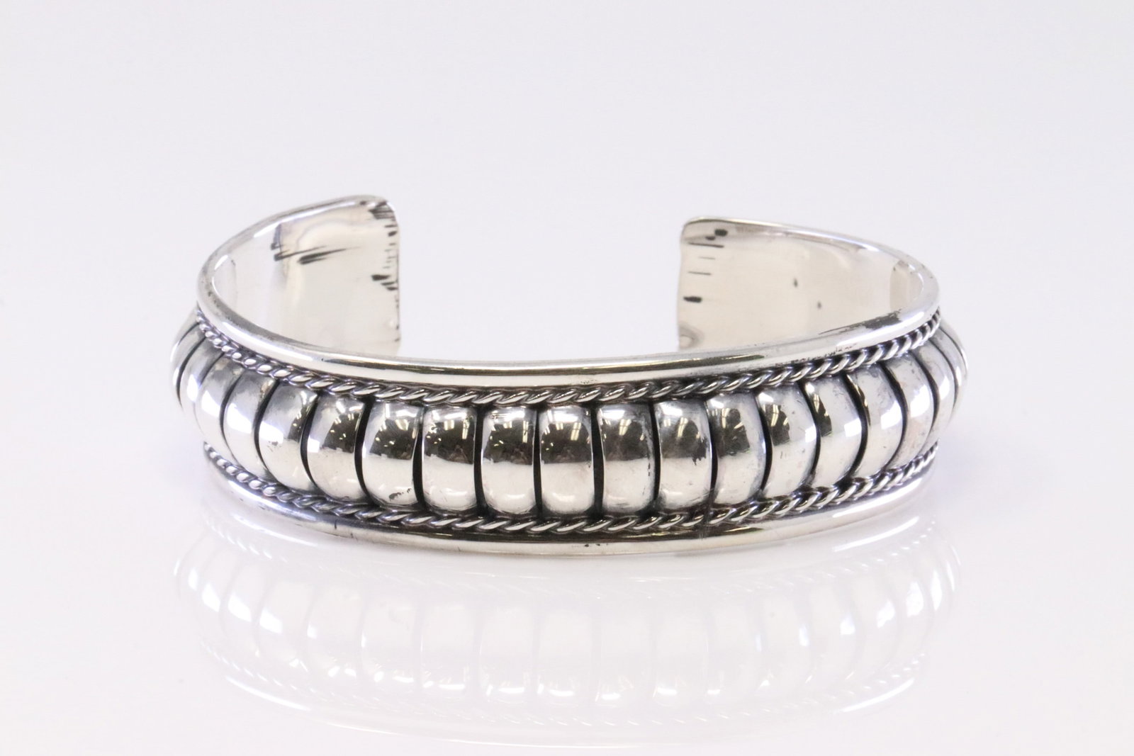 Native America Navajo Sterling Silver Bracelet Cuff By Manuel Johnson.: This is a Native America Navajo Sterling Silver Bracelet Cuff By Manuel Johnson.