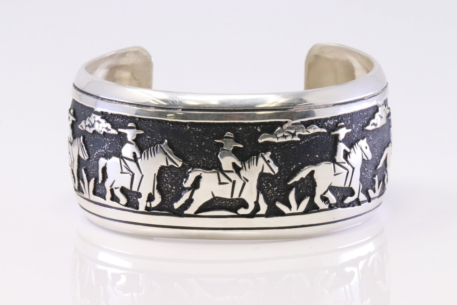 Native America Navajo Sterling Silver Storyteller Stamp Bracelet By T&R Singer.: This is a Native America Navajo Sterling Silver Storyteller Stamp Bracelet By T&R Singer.