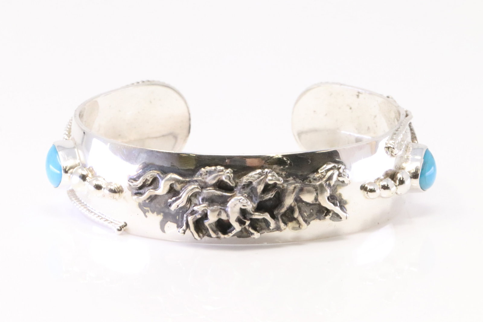 Native America Navajo Sterling Silver Turquoise Horse Bracelet Cuff By Bobby Platero.: This is a Native America Navajo Sterling Silver Turquoise Horse Bracelet Cuff By Bobby Platero.