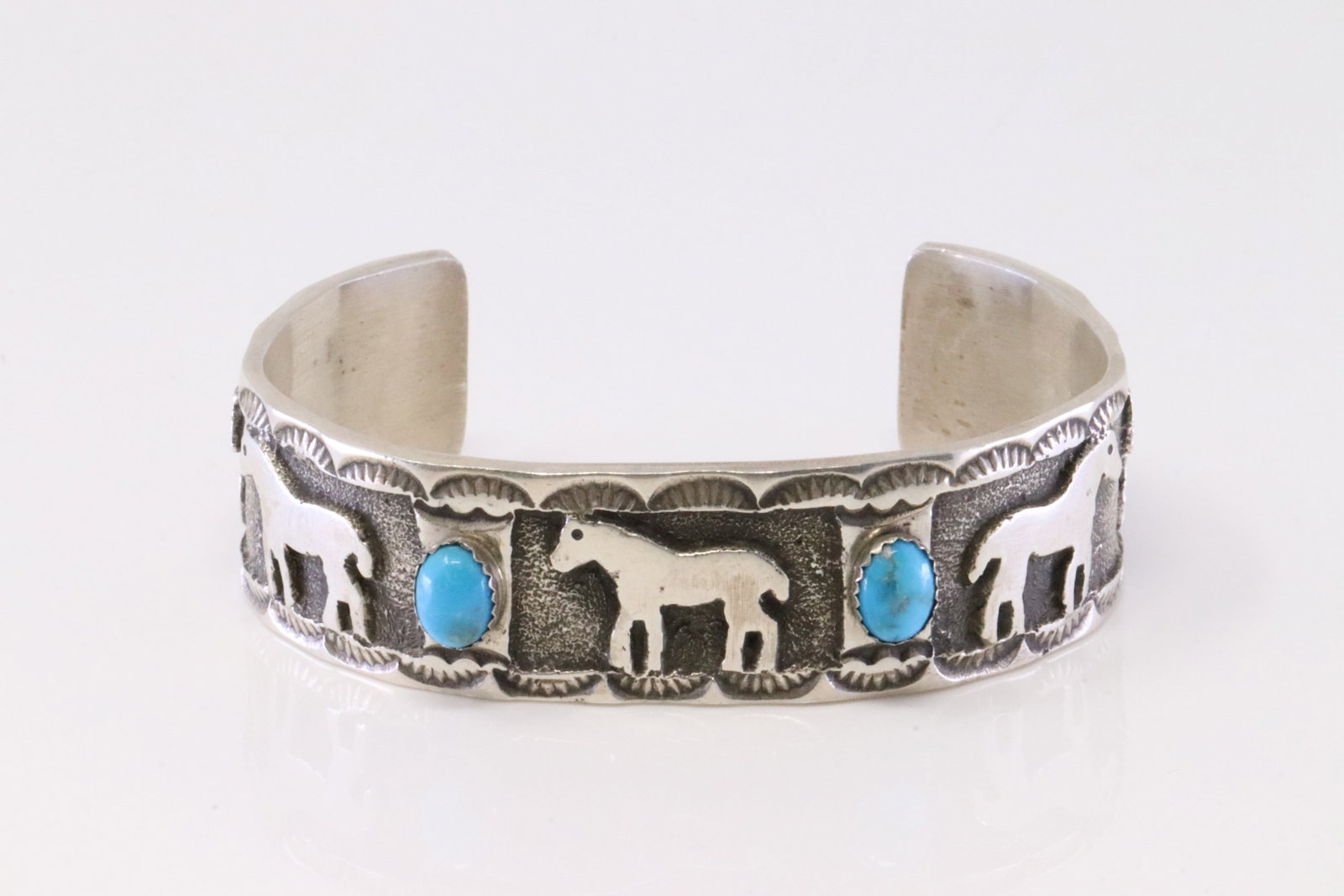 Native America Navajo Sterling Silver Turquoise Horse Bracelet Cuff By K.: This is a Native America Navajo Sterling Silver Turquoise Horse Bracelet Cuff By K.