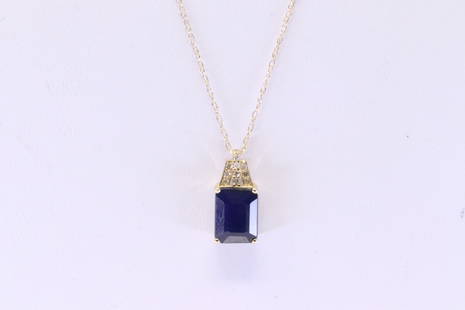 Sapphire & Diamond Pendant / Necklace 10Kt.: Ladies 10Kt Yellow Gold Sapphire & Diamond Pendant / Necklace. Pendant has Blue Sapphire Cut with 10 round accent Diamonds & A 10K Necklace. Diamonds weight: 0.05 cttw. Necklace length: 18.00"