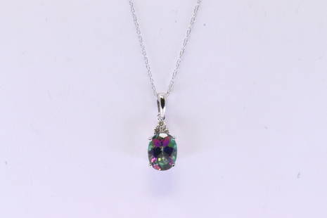 Mystic Topaz & Diamond Pendant / Necklace 10Kt.: Ladies 10Kt White Gold Mystic Topaz & Diamond / Necklace. Pendant has Oval Mystic Topaz with 3 accent & A 10K Necklace. Necklace length: 18.00"