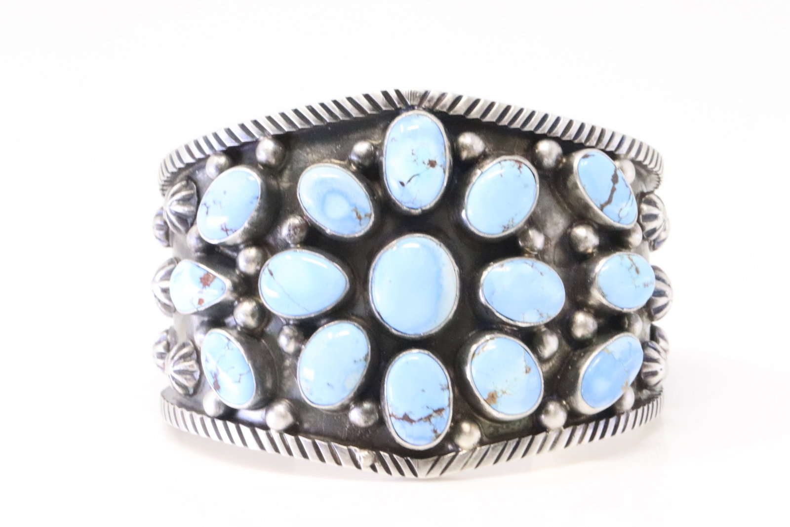 Native America Navajo Sterling Silver Golden Hills Turquoise Bracelet By Bobby Johnson.: This is a Native America Navajo Sterling Silver Golden Hills Turquoise Bracelet By Bobby Johnson.