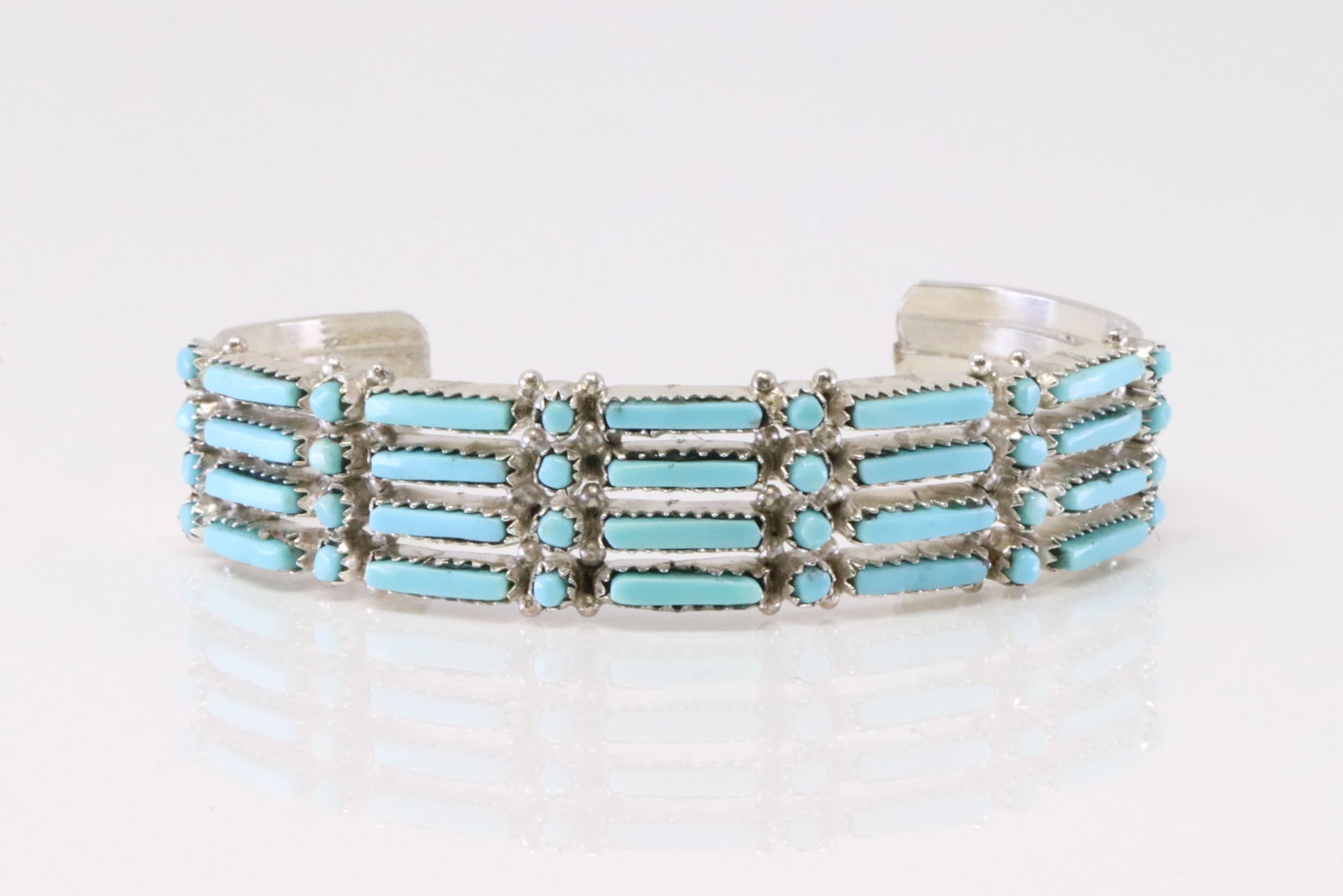 Native America Zuni Sterling Silver Turquoise Bracelet By J.W.: This is a Native America Zuni Sterling Silver Turquoise Bracelet By J.W.