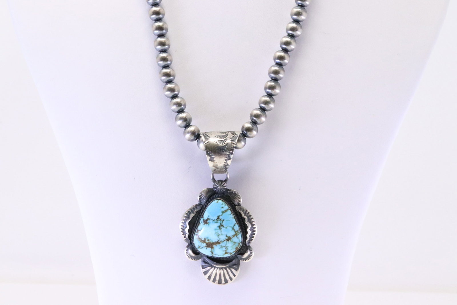 Native American Navajo Sterling Silver Kingman Turquoise Pendant By Gilbert Tom. With Pearl Beaded: This is a Native American Navajo Sterling Silver Kingman Turquoise Pendant By Gilbert Tom. With Pearl Beaded Sterling Silver Machine Made Necklace. Necklace length: 16.00"