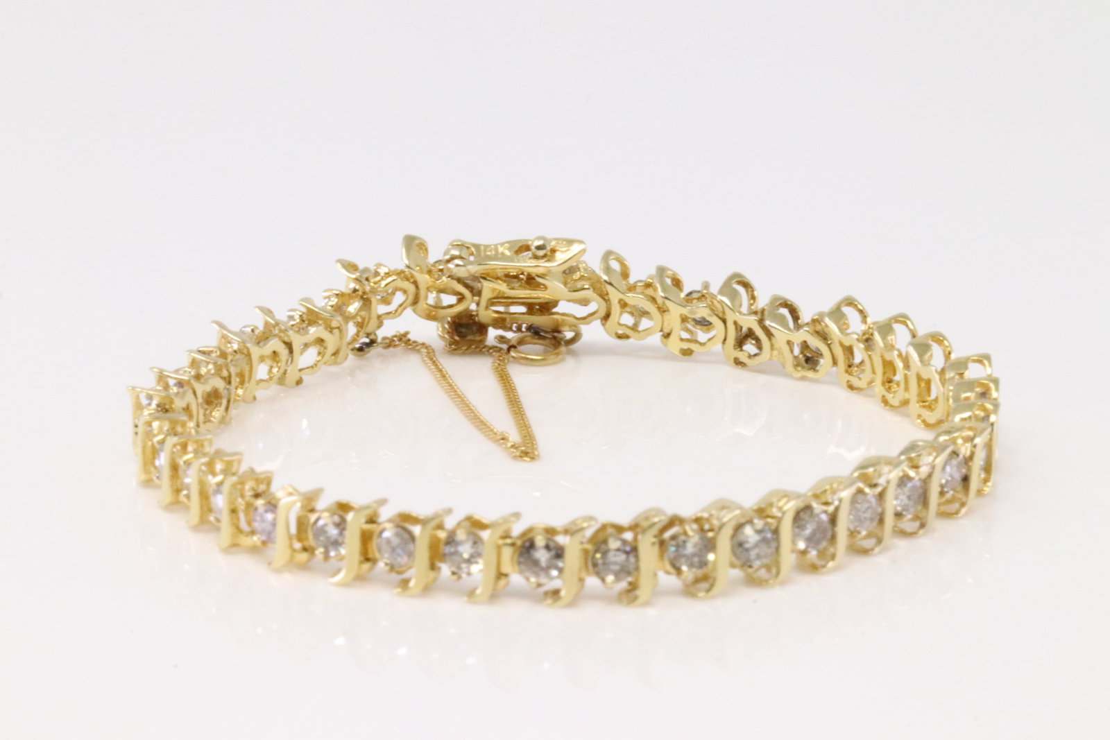Diamond Tennis Bracelet 14Kt.: 14Kt Yellow Gold Diamond Tennis Bracelet. Bracelet has 35 round Diamonds. Diamonds approx weight: 3.50cttw. Bracelet length: Total weight: 11.70 Grams.