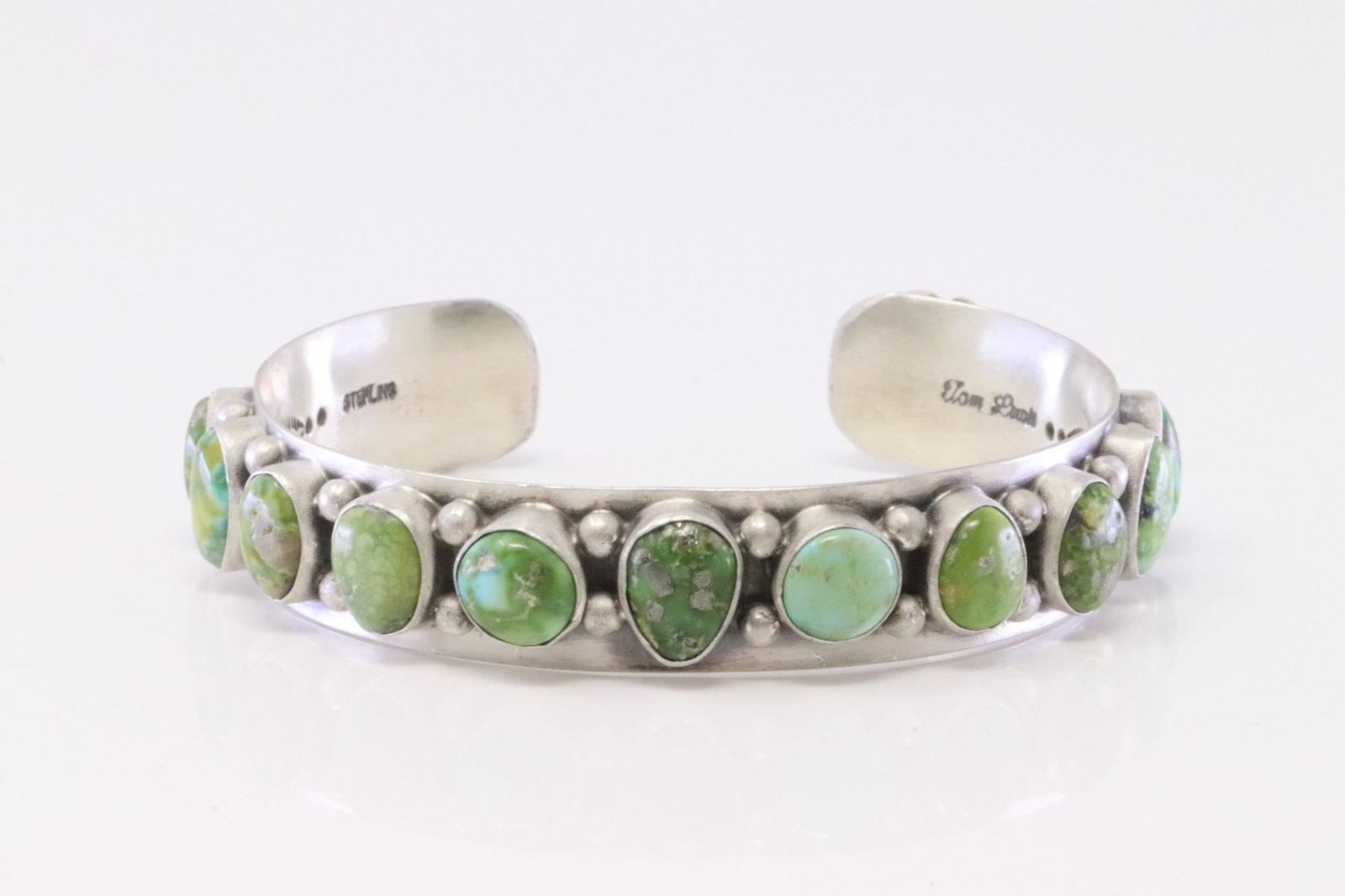 Native America Navajo Sterling Silver Sonora Gold Turquoise Bracelet By Tom Lewis.: This is a Native America Navajo Sterling Silver Sonora Gold Turquoise Bracelet By Tom Lewis.